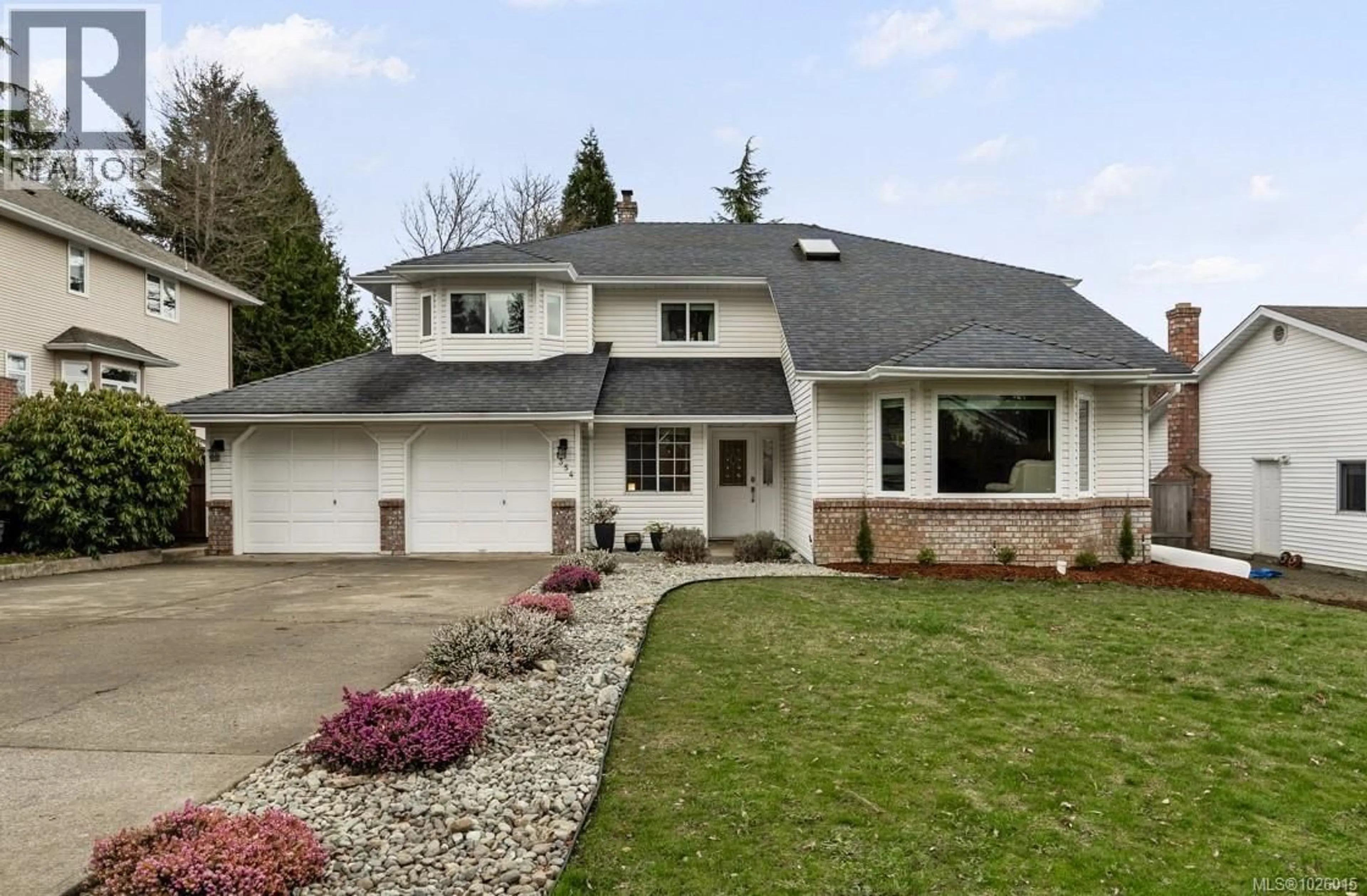 Home with vinyl exterior material, street for 1354 MALAHAT DRIVE, Courtenay British Columbia V9N8B2