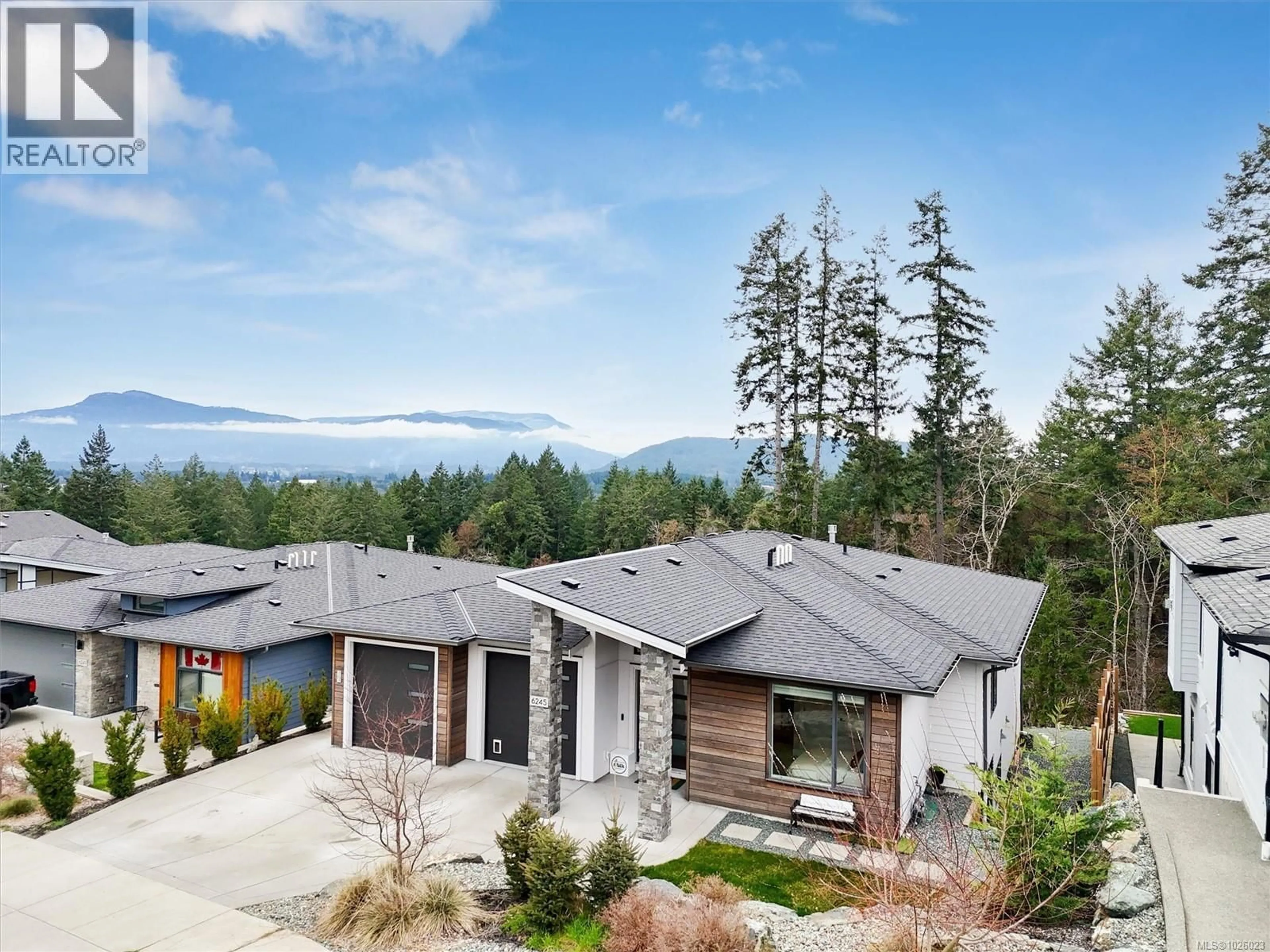 A pic from outside/outdoor area/front of a property/back of a property/a pic from drone, mountain view for 6245 HIGHWOOD DRIVE, Duncan British Columbia V9L0H5