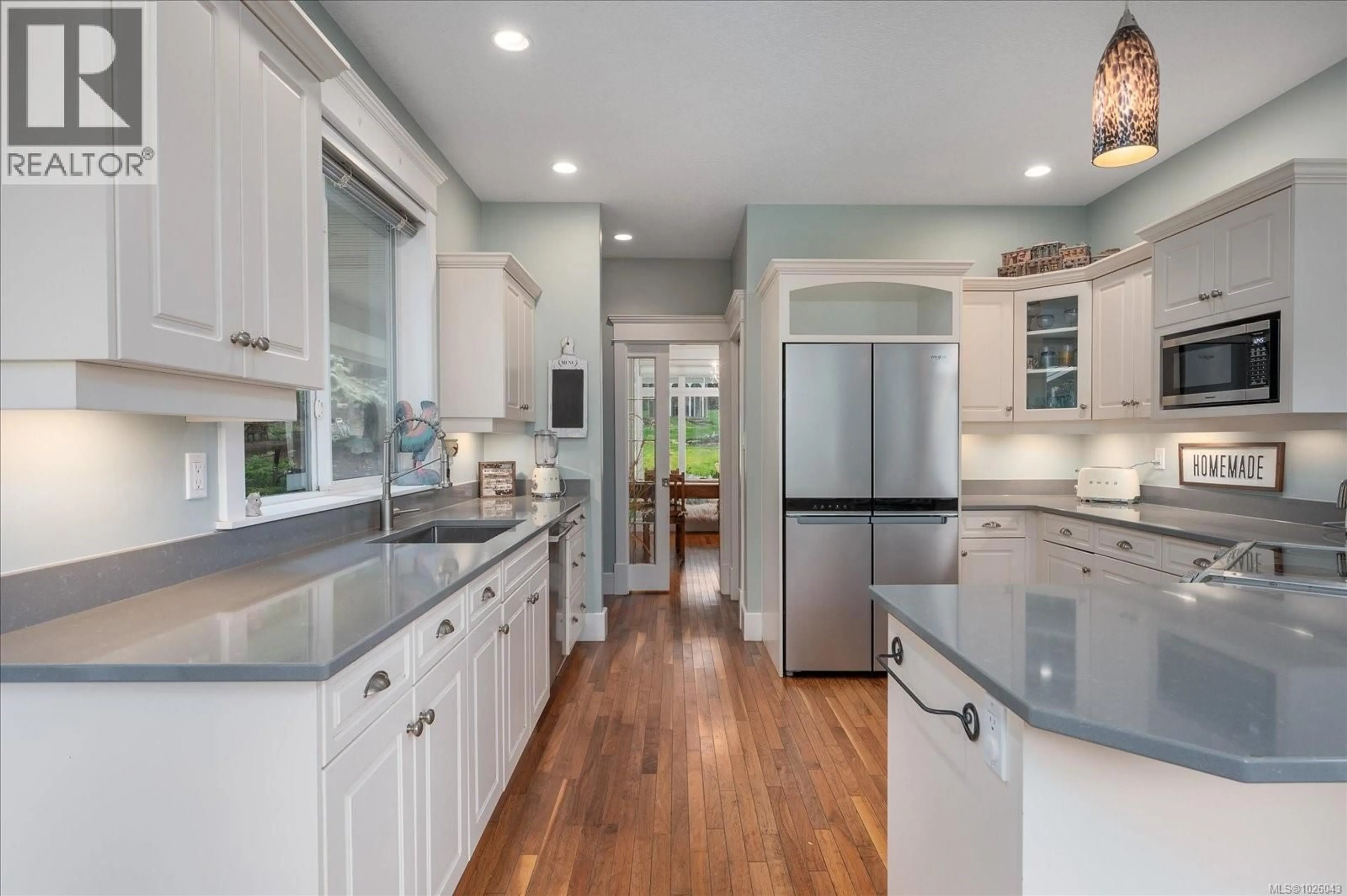 Open concept kitchen, ceramic/tile floor for 409 FOURNEAU WAY, Parksville British Columbia V9P2J8