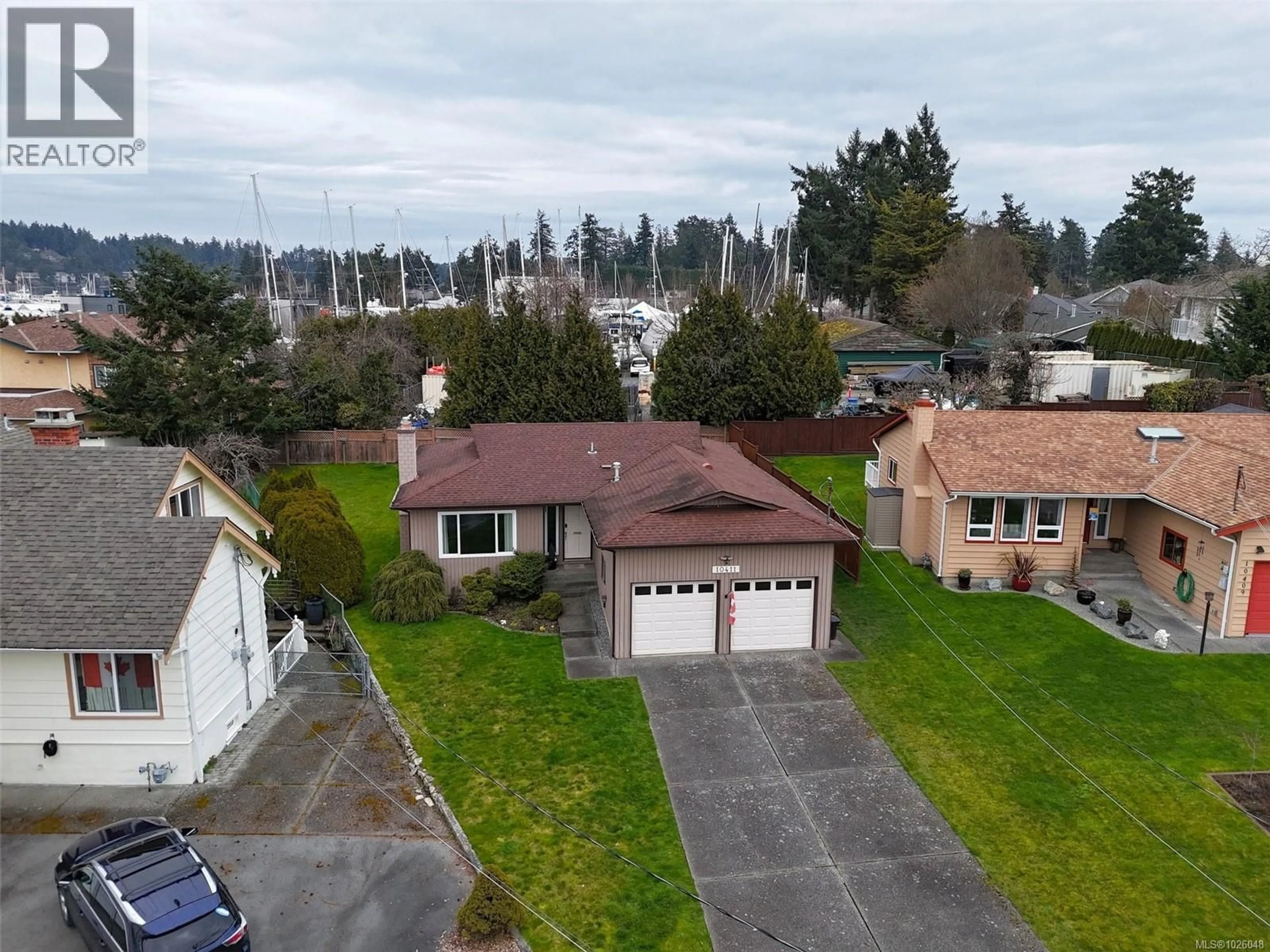 A pic from outside/outdoor area/front of a property/back of a property/a pic from drone, street for 10411 FINCH PLACE, Sidney British Columbia V8L4P7