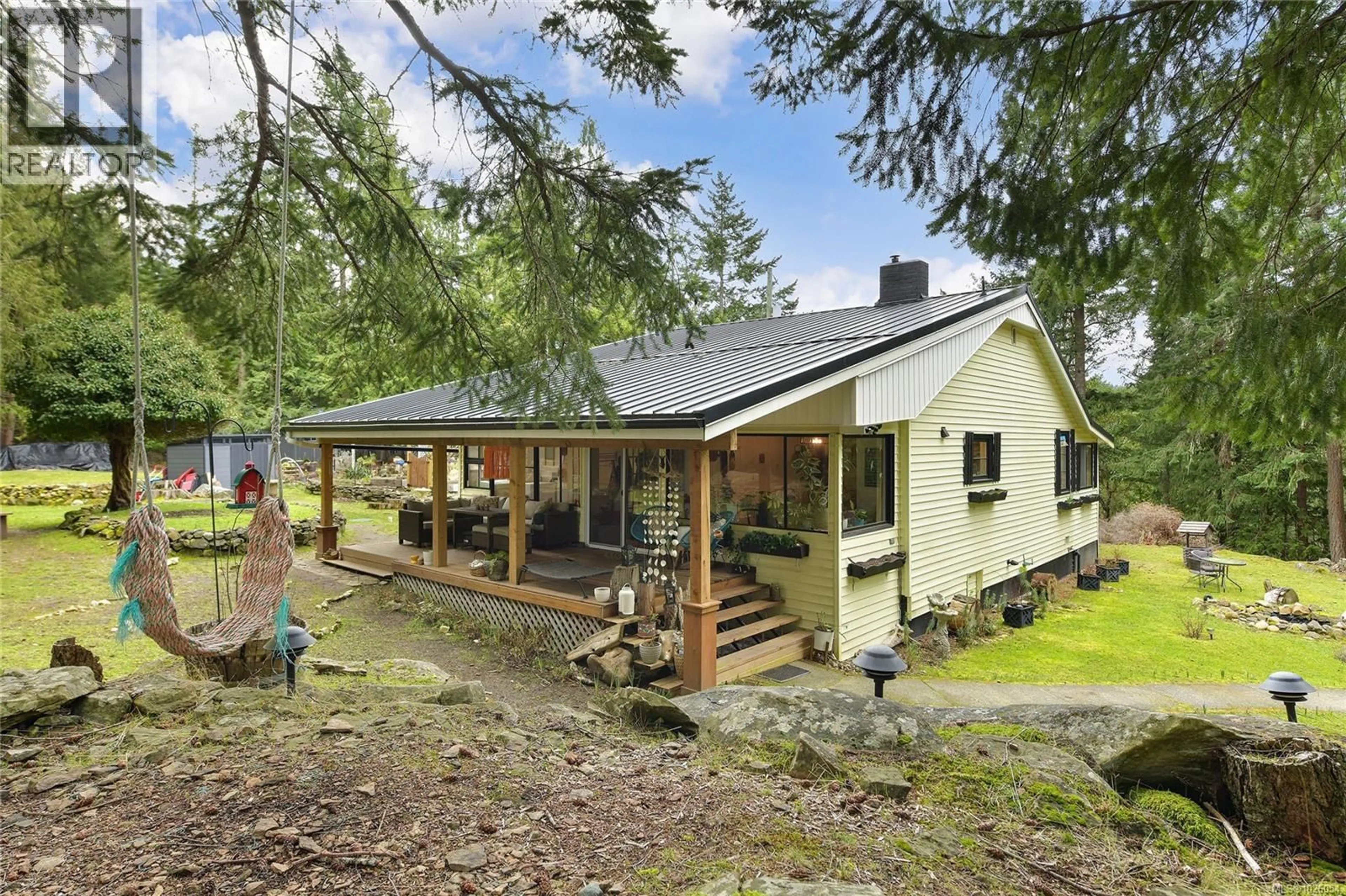 A pic from outside/outdoor area/front of a property/back of a property/a pic from drone, unknown for 370 CAMPBELL BAY ROAD, Mayne Island British Columbia V0N2J1