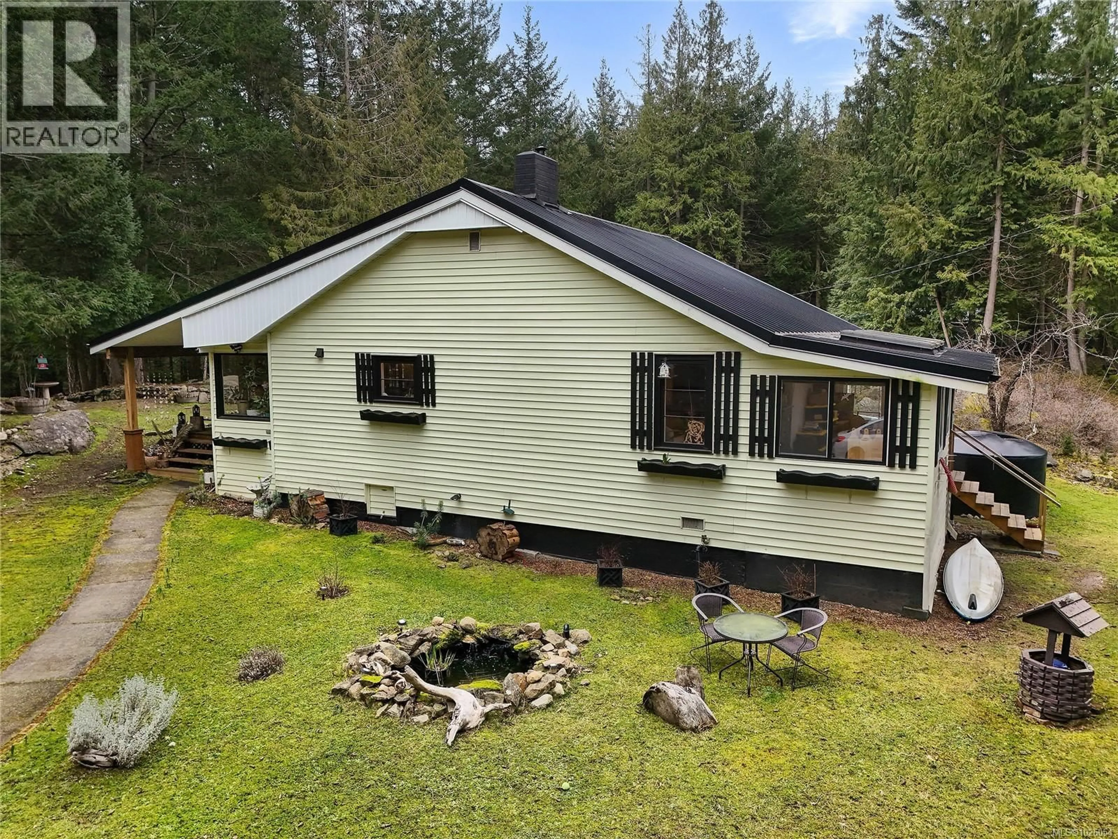 A pic from outside/outdoor area/front of a property/back of a property/a pic from drone, unknown for 370 CAMPBELL BAY ROAD, Mayne Island British Columbia V0N2J1