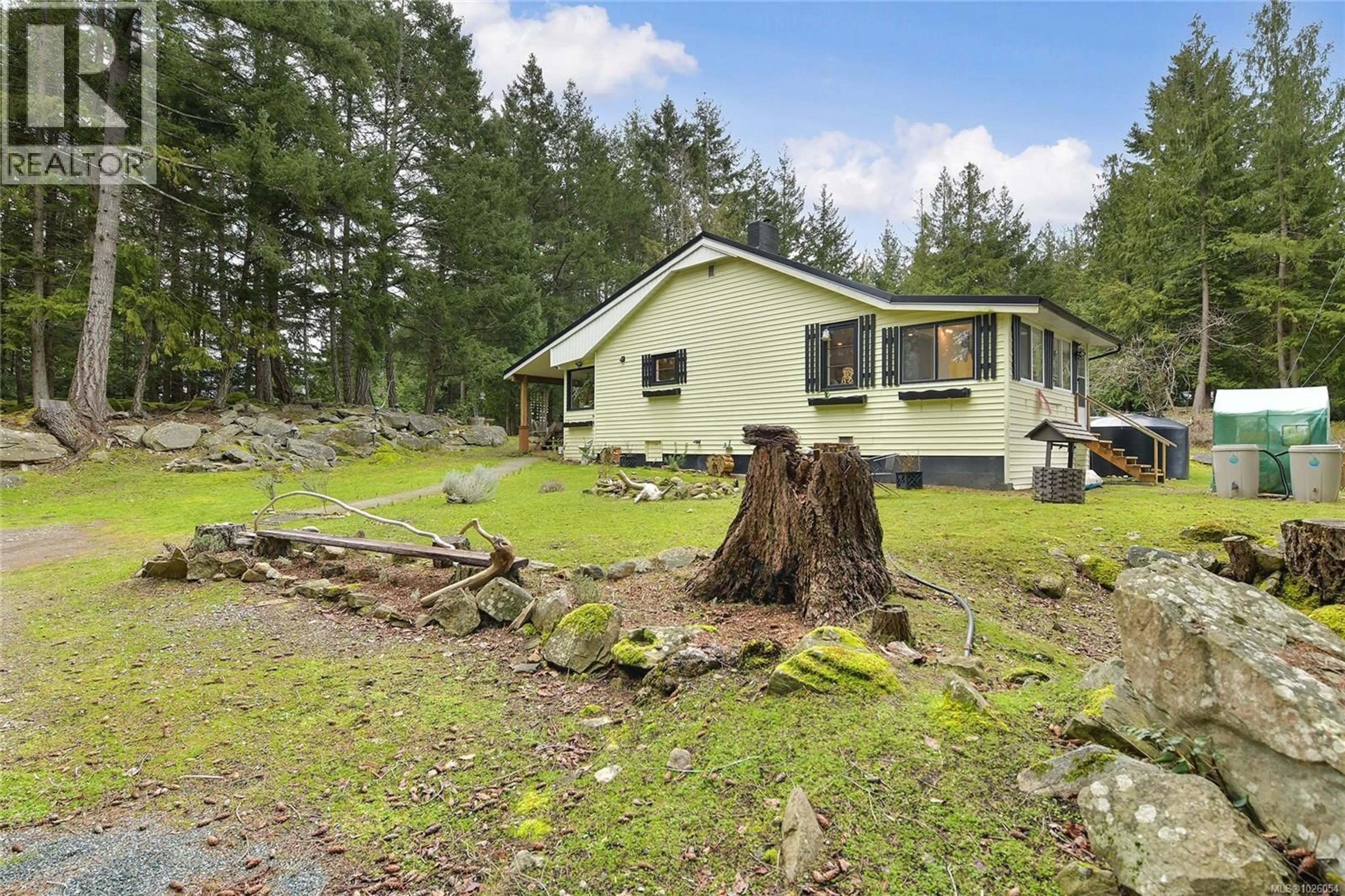 A pic from outside/outdoor area/front of a property/back of a property/a pic from drone, forest/trees view for 370 CAMPBELL BAY ROAD, Mayne Island British Columbia V0N2J1