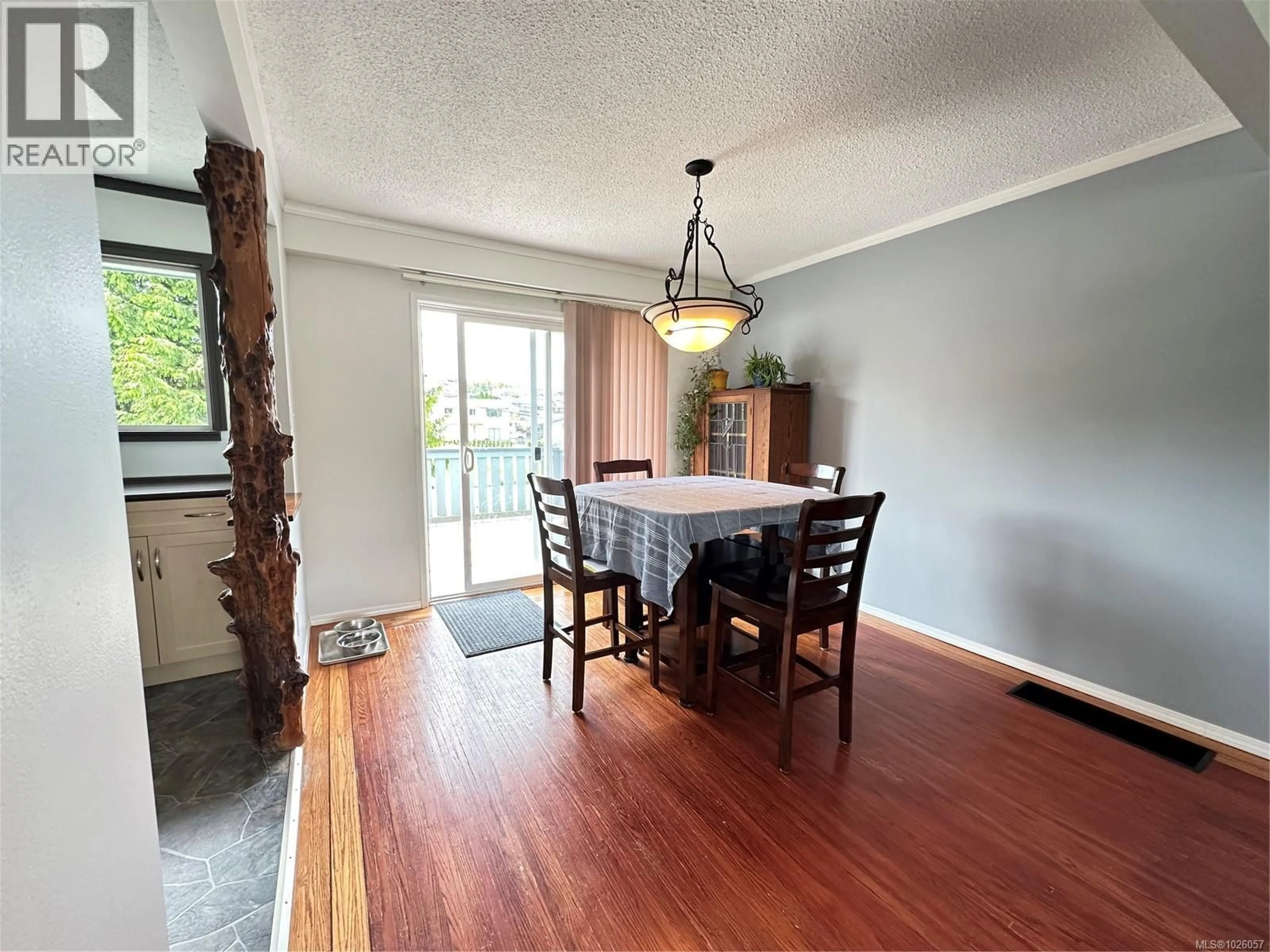 Dining room, wood/laminate floor for 2365 CATALA PLACE, Port McNeill British Columbia V0N2R0