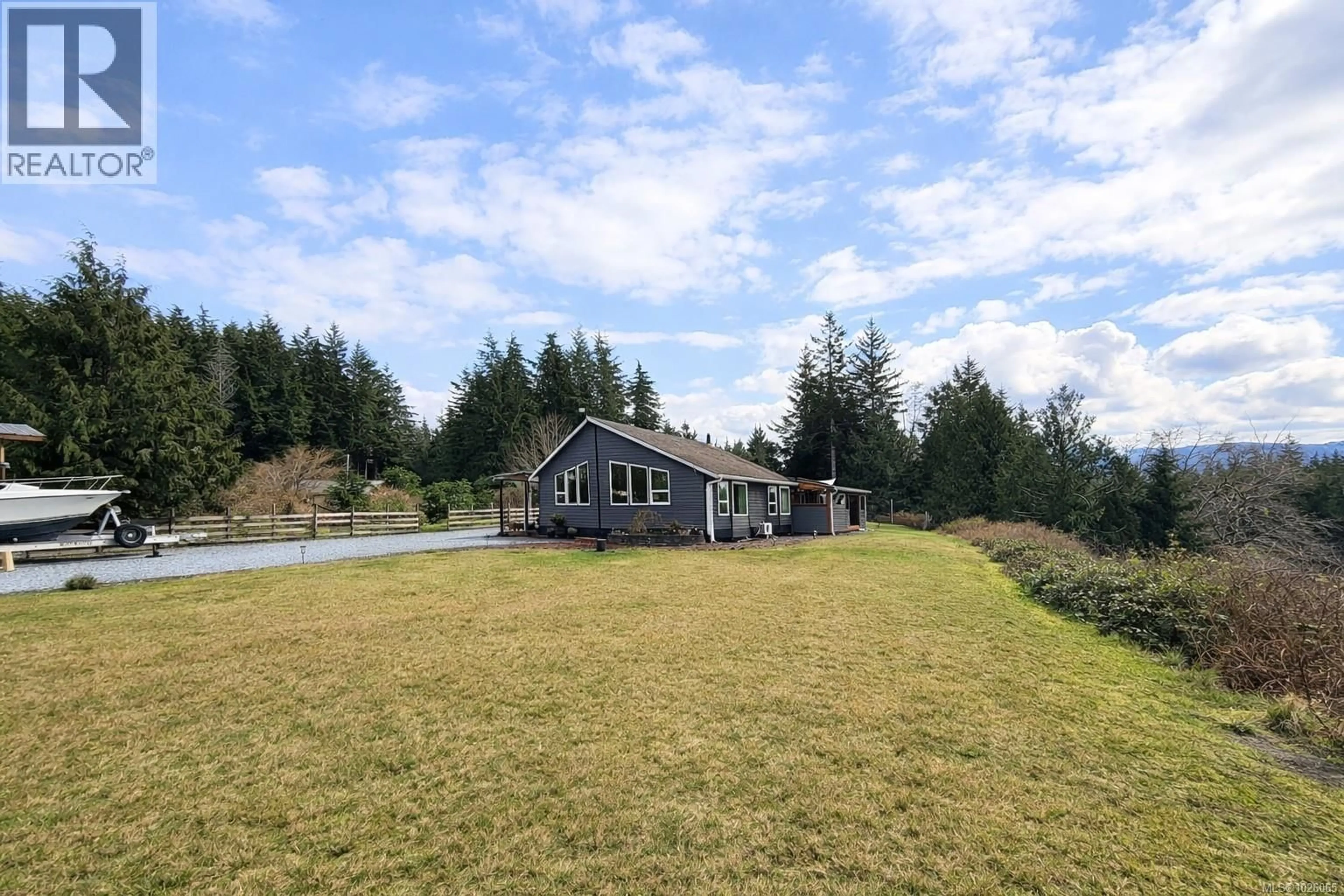 A pic from outside/outdoor area/front of a property/back of a property/a pic from drone, unknown for 1101 EWEN ROAD, Hyde Creek British Columbia V0N2R0