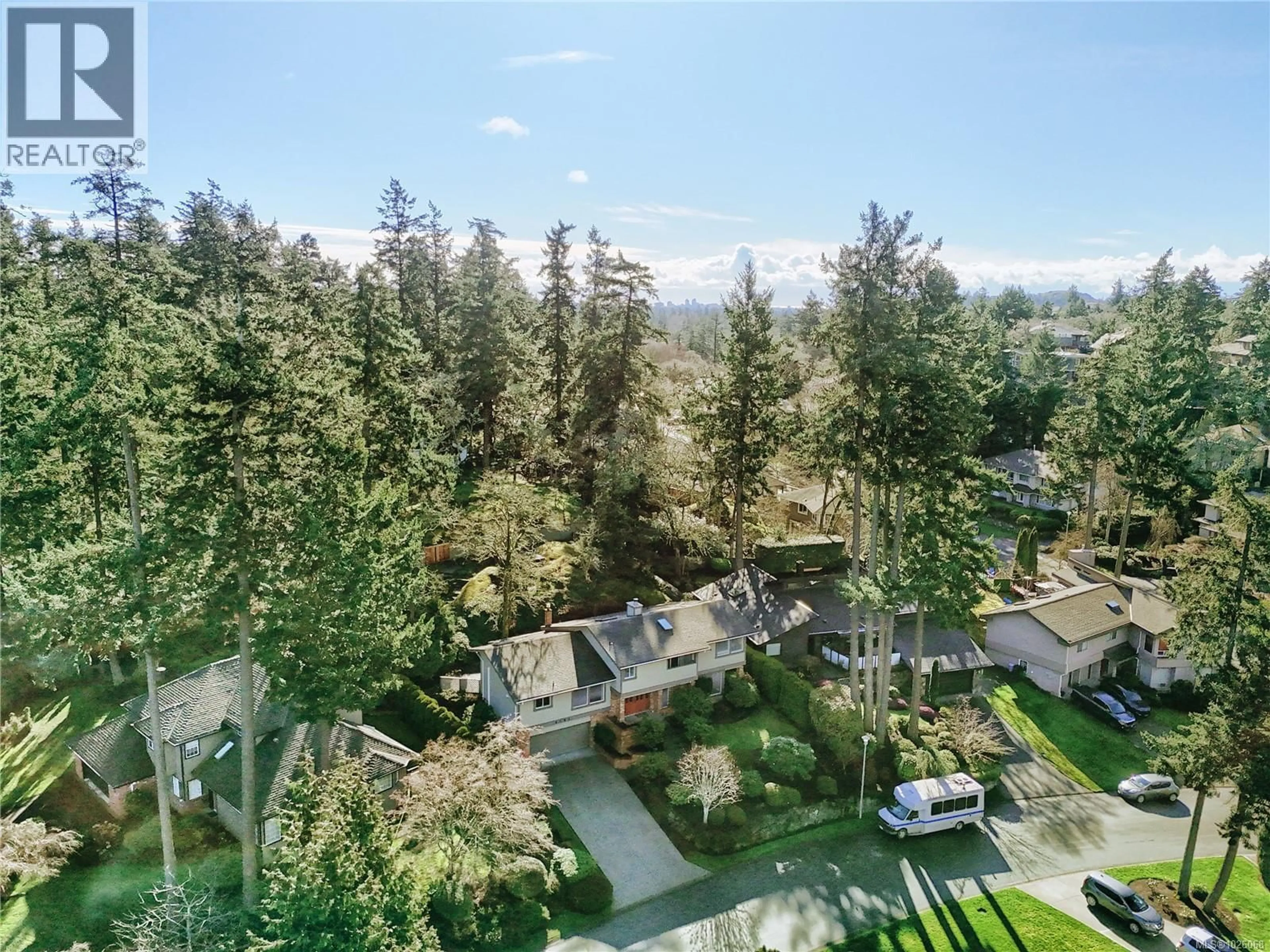 A pic from outside/outdoor area/front of a property/back of a property/a pic from drone, forest/trees view for 4381 PARKWOOD TERRACE, Saanich British Columbia V8X4Z8