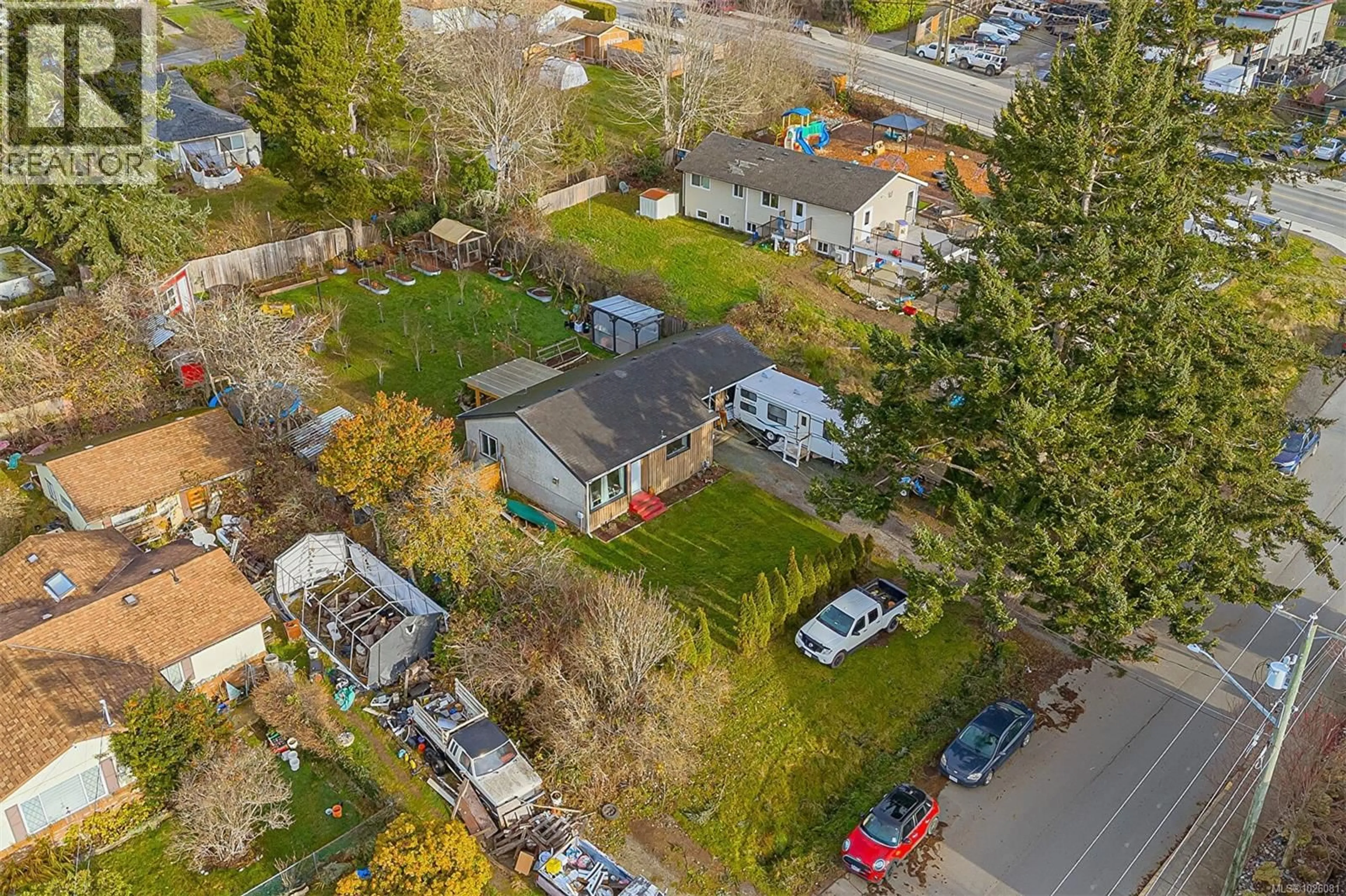 A pic from outside/outdoor area/front of a property/back of a property/a pic from drone, street for 6716 AYRE ROAD, Sooke British Columbia V9Z0H1