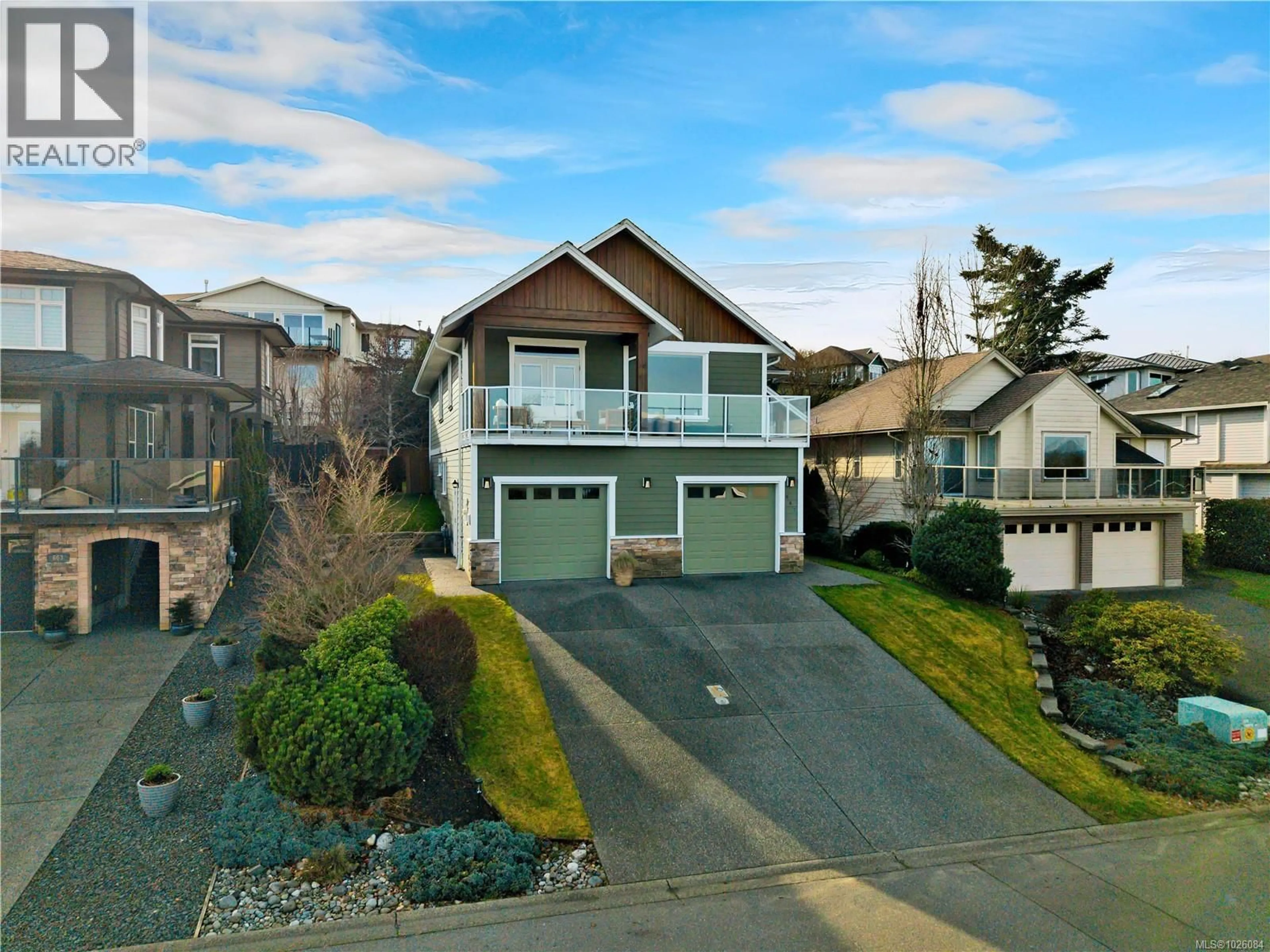 Home with vinyl exterior material, street for 667 NELSON ROAD, Campbell River British Columbia V9H1T7