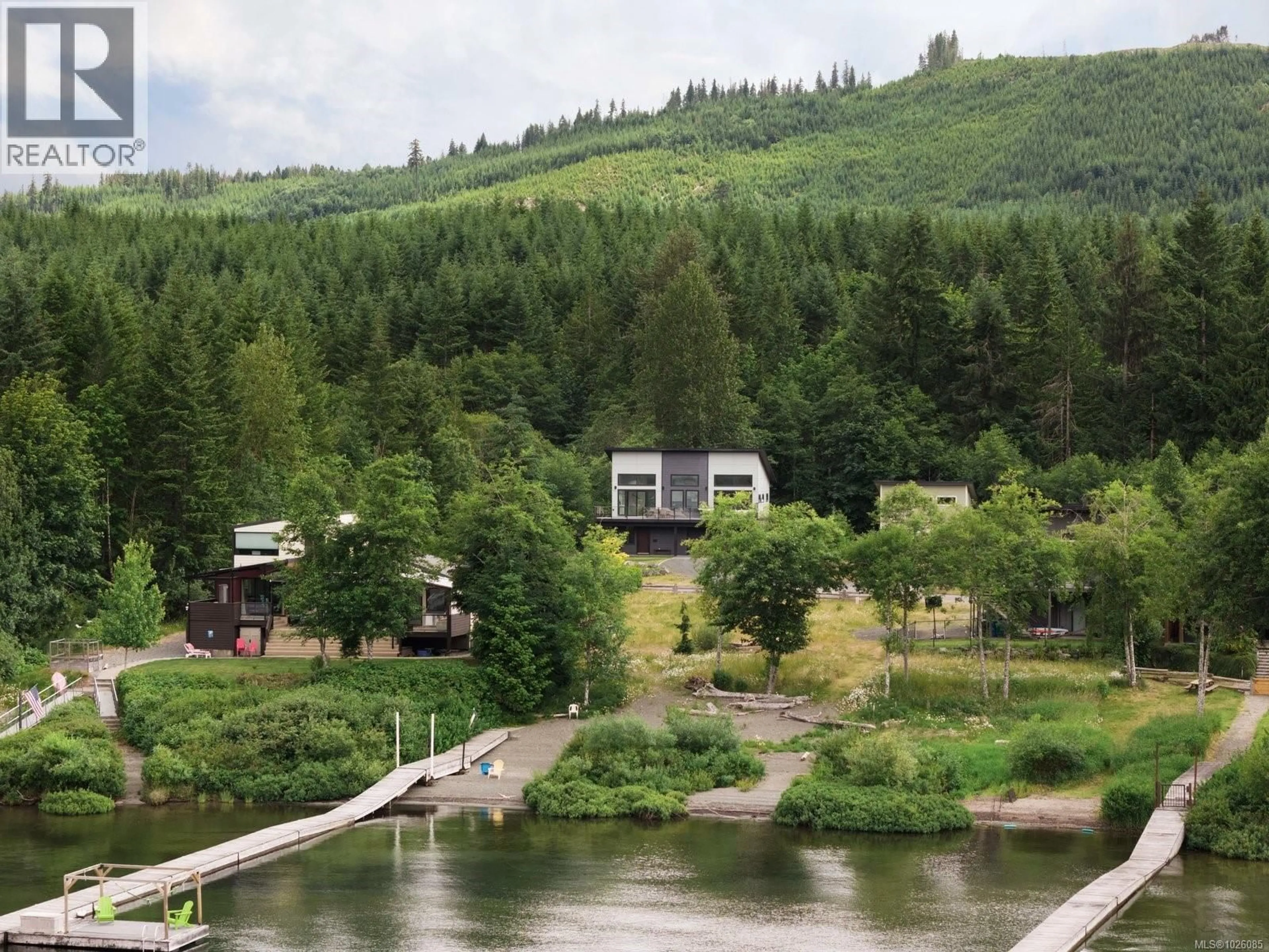 A pic from outside/outdoor area/front of a property/back of a property/a pic from drone, water/lake/river/ocean view for 9846 STIN-QUA ROAD, Honeymoon Bay British Columbia V0R1Y0
