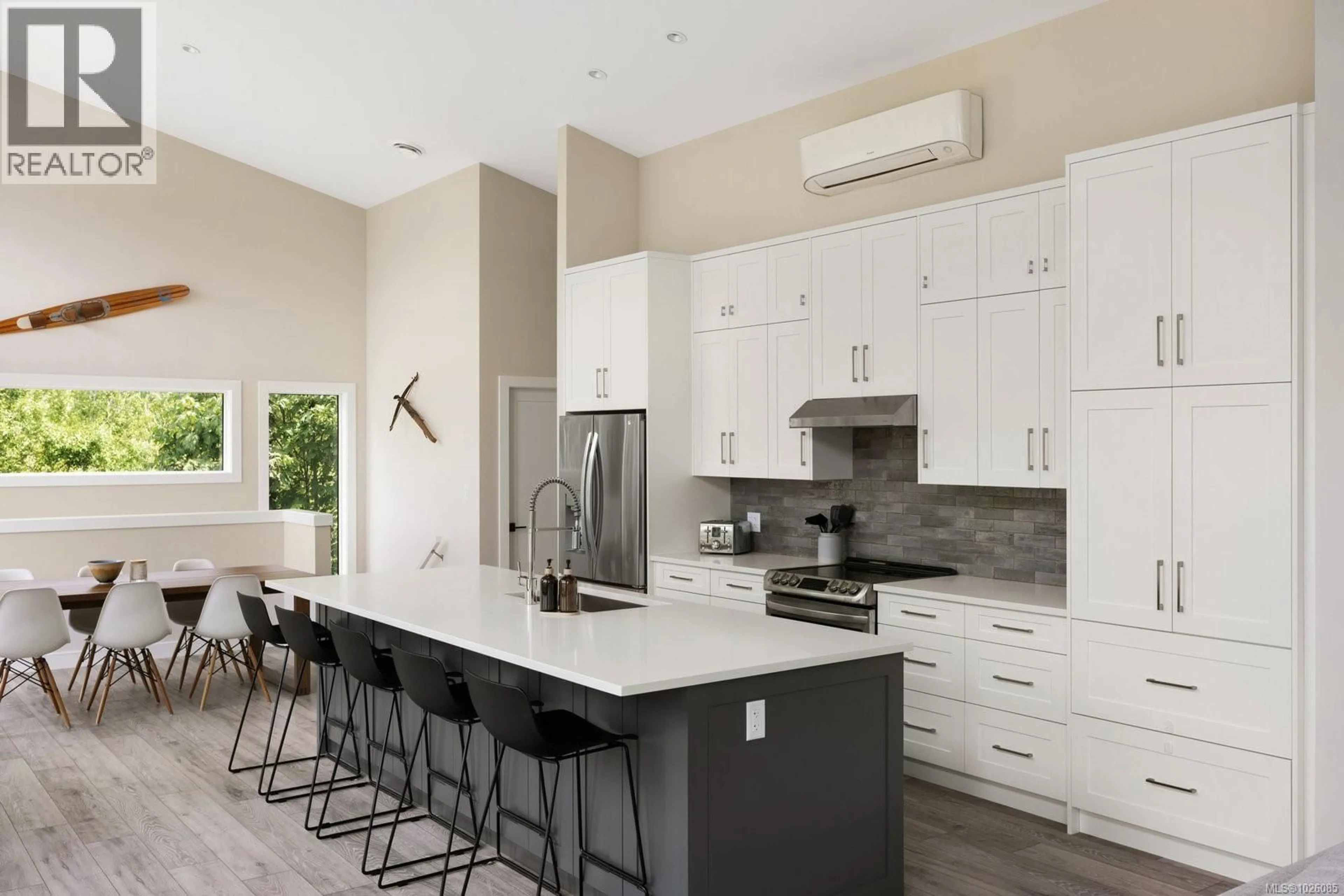 Open concept kitchen, ceramic/tile floor for 9846 STIN-QUA ROAD, Honeymoon Bay British Columbia V0R1Y0