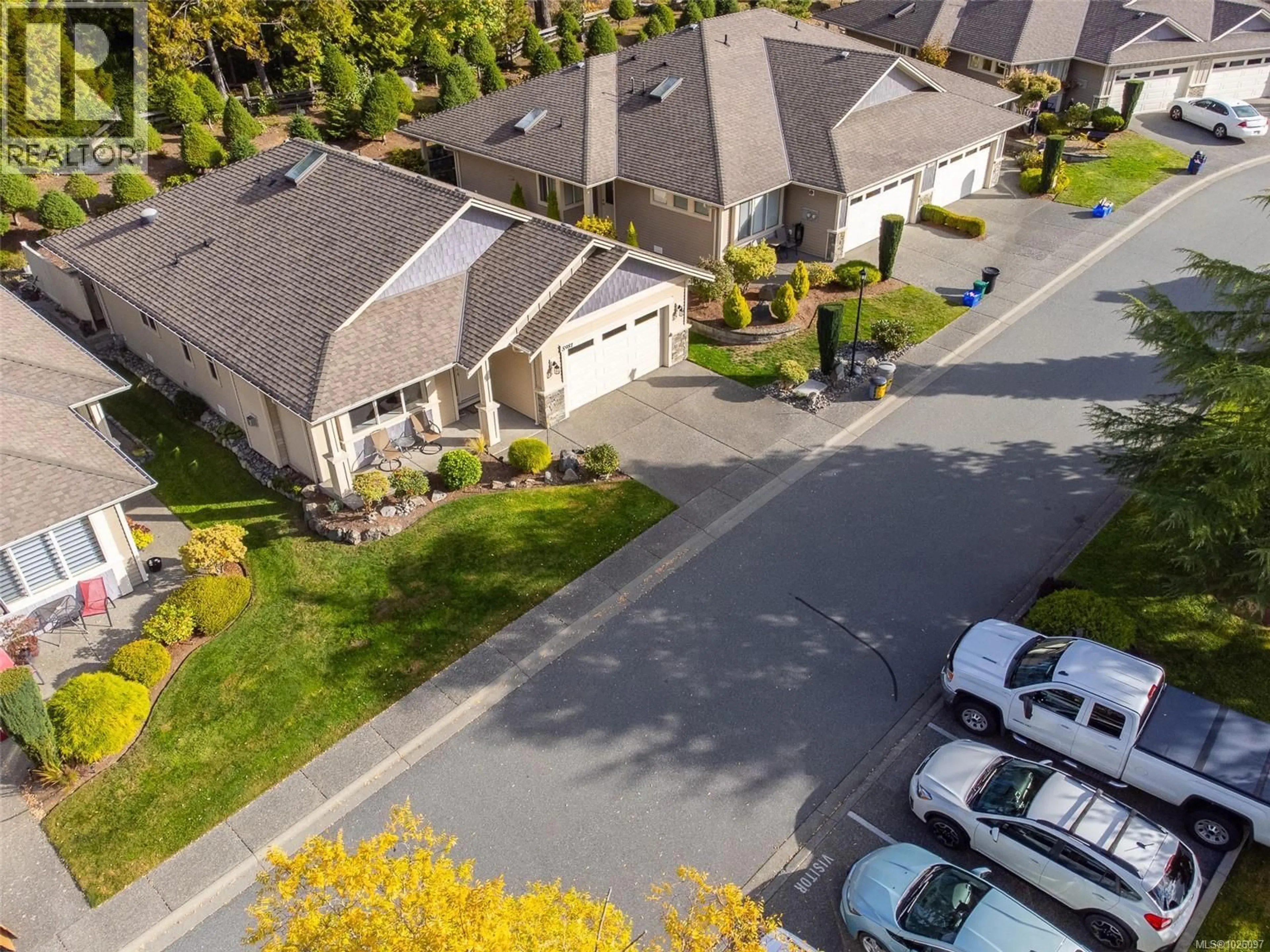 A pic from outside/outdoor area/front of a property/back of a property/a pic from drone, street for 5981 KADEN PLACE, Nanaimo British Columbia V9T0B5