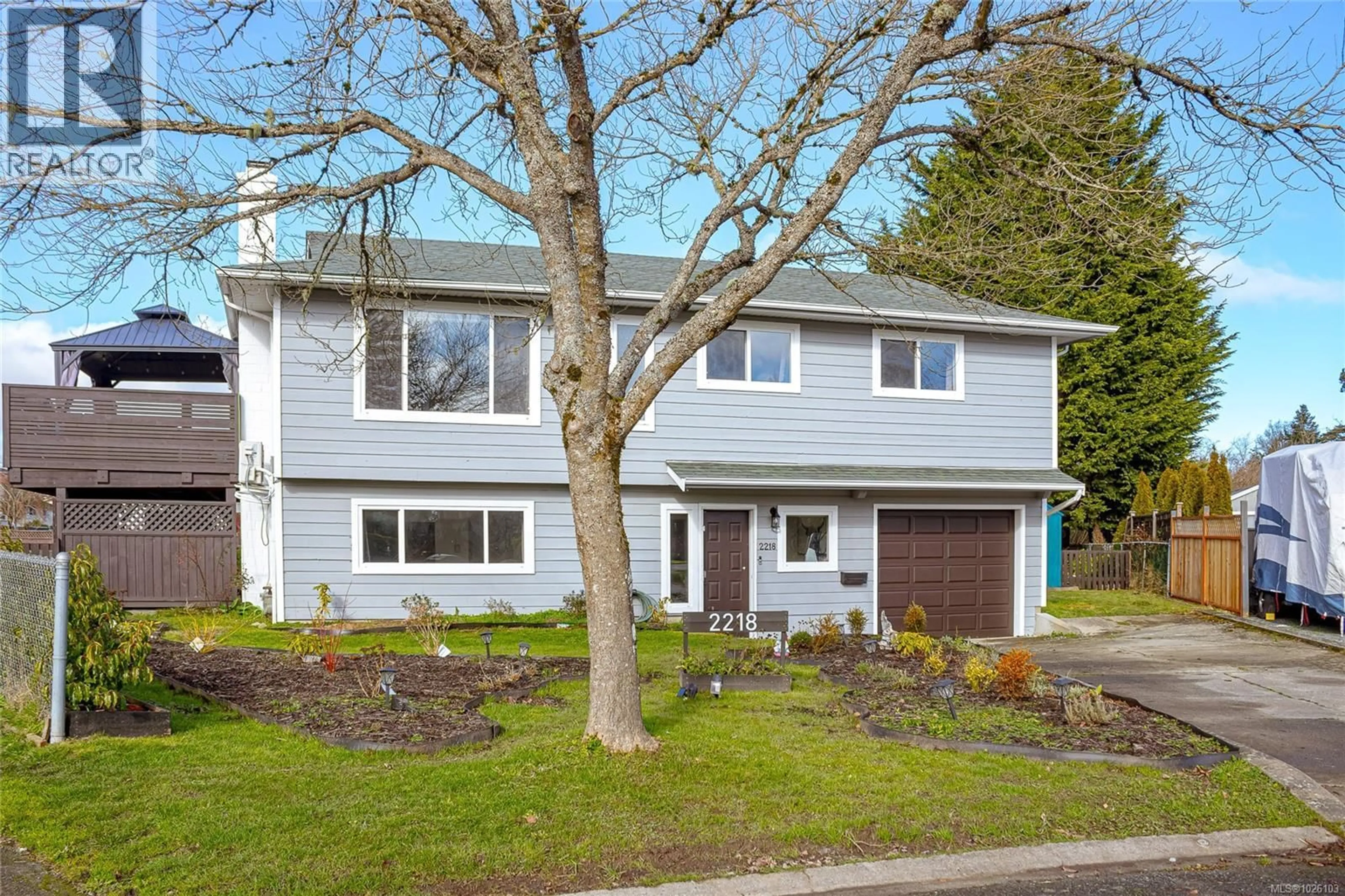 Home with vinyl exterior material, street for 2218 MAGNOLIA PLACE, Sidney British Columbia V8L4C9