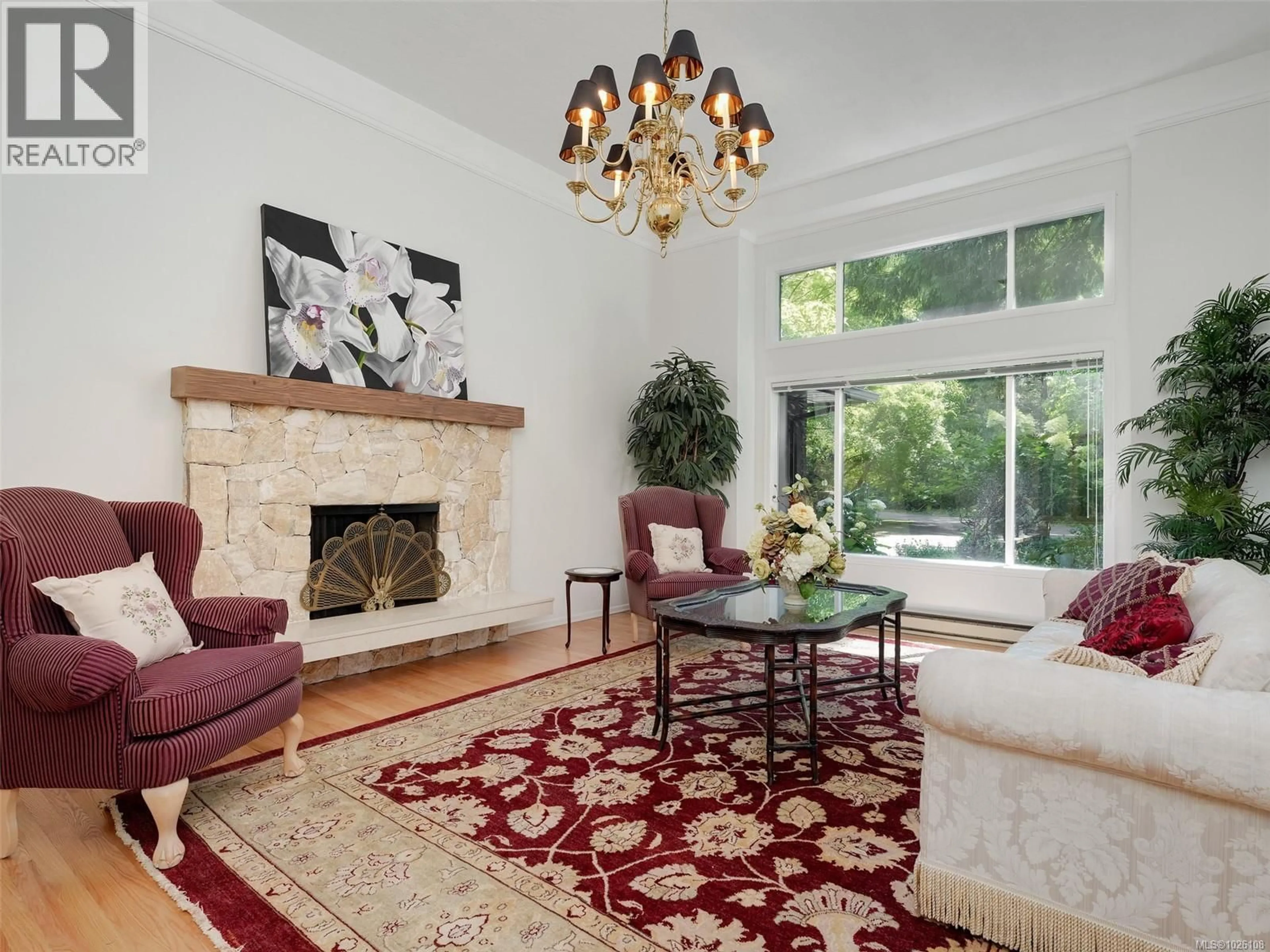 Living room with furniture, carpet floor for 4860 EXCELSIOR ROAD, Saanich British Columbia V9E2E5