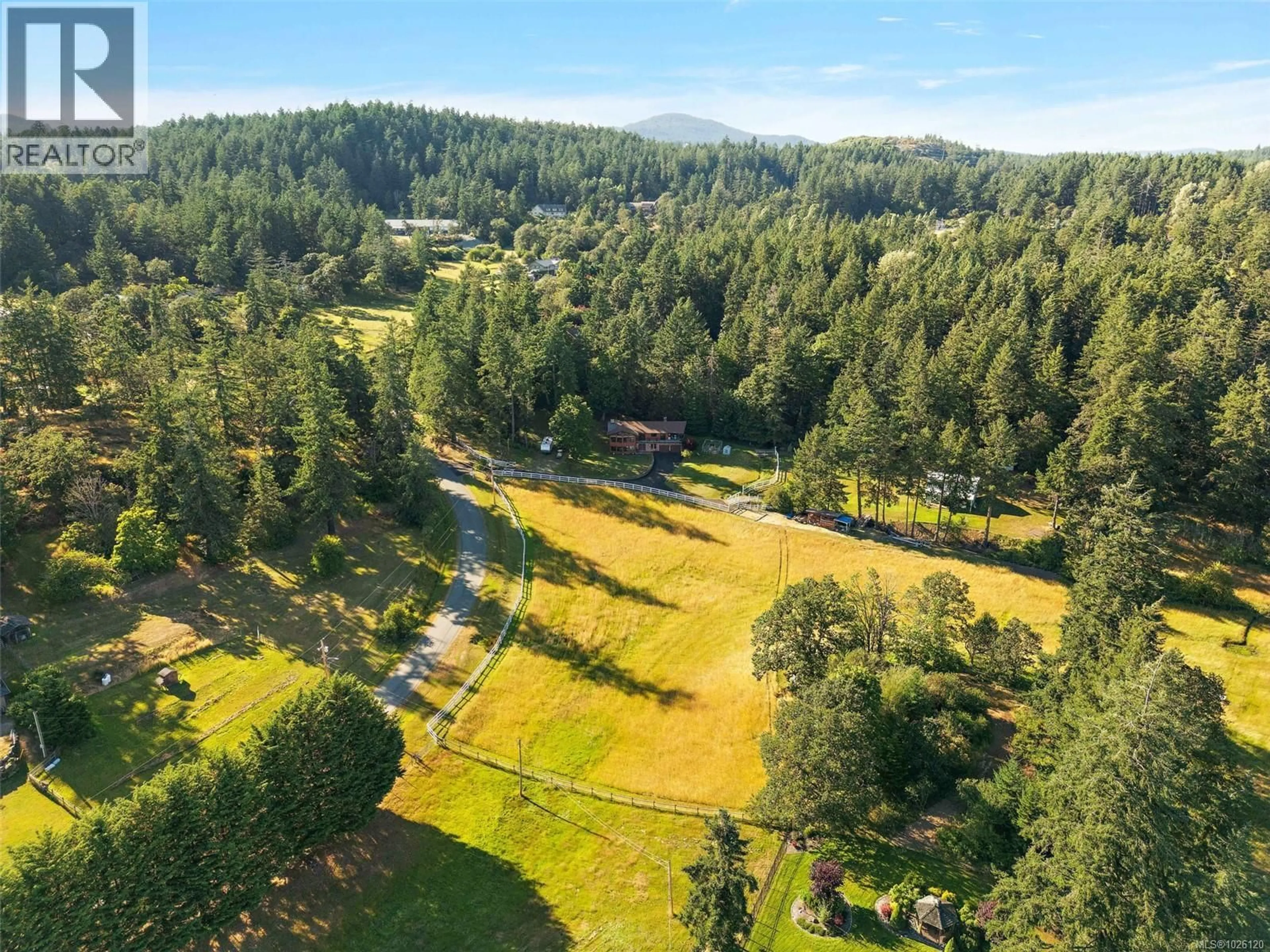 A pic from outside/outdoor area/front of a property/back of a property/a pic from drone, forest/trees view for 1649 CHARLTON ROAD, Saanich British Columbia V9E2C8