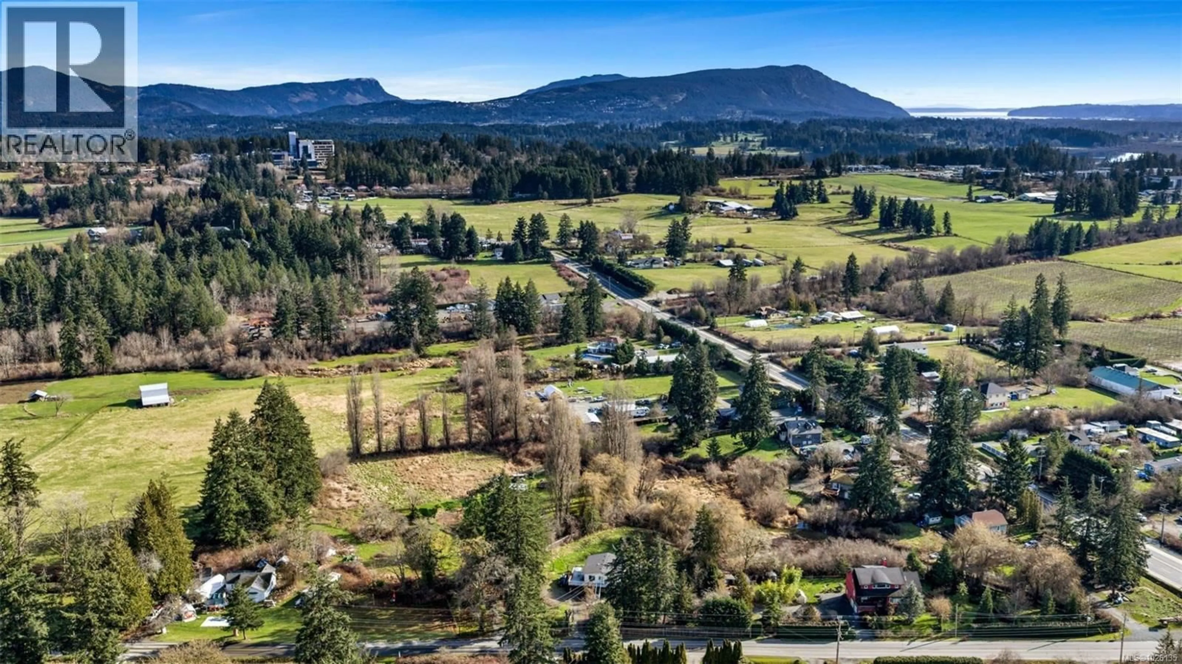 A pic from outside/outdoor area/front of a property/back of a property/a pic from drone, mountain view for 6767 SOMENOS ROAD, Duncan British Columbia V9L5Z3