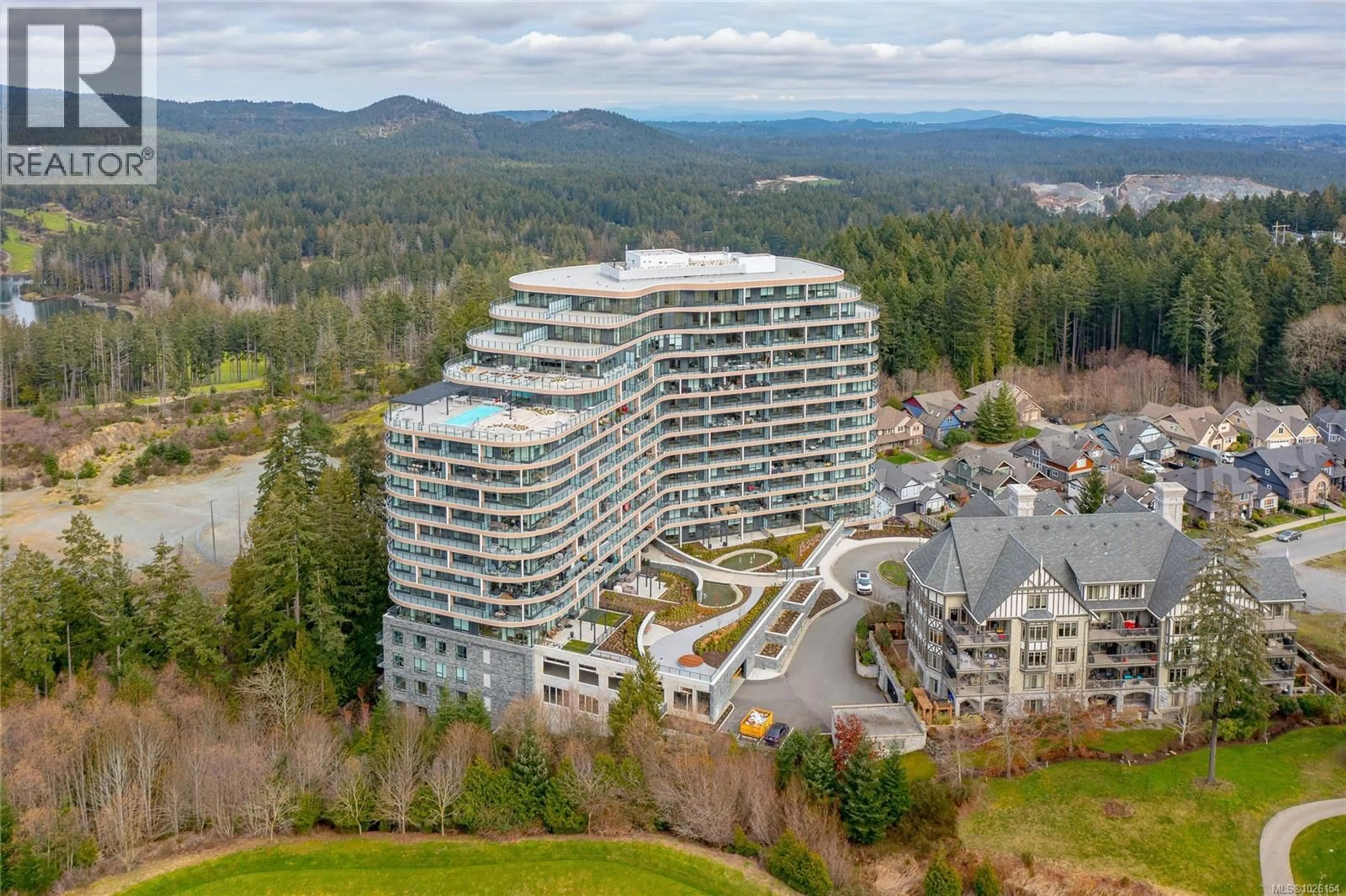 A pic from outside/outdoor area/front of a property/back of a property/a pic from drone, mountain view for 915 - 2000 HANNINGTON ROAD, Langford British Columbia V9B6R6