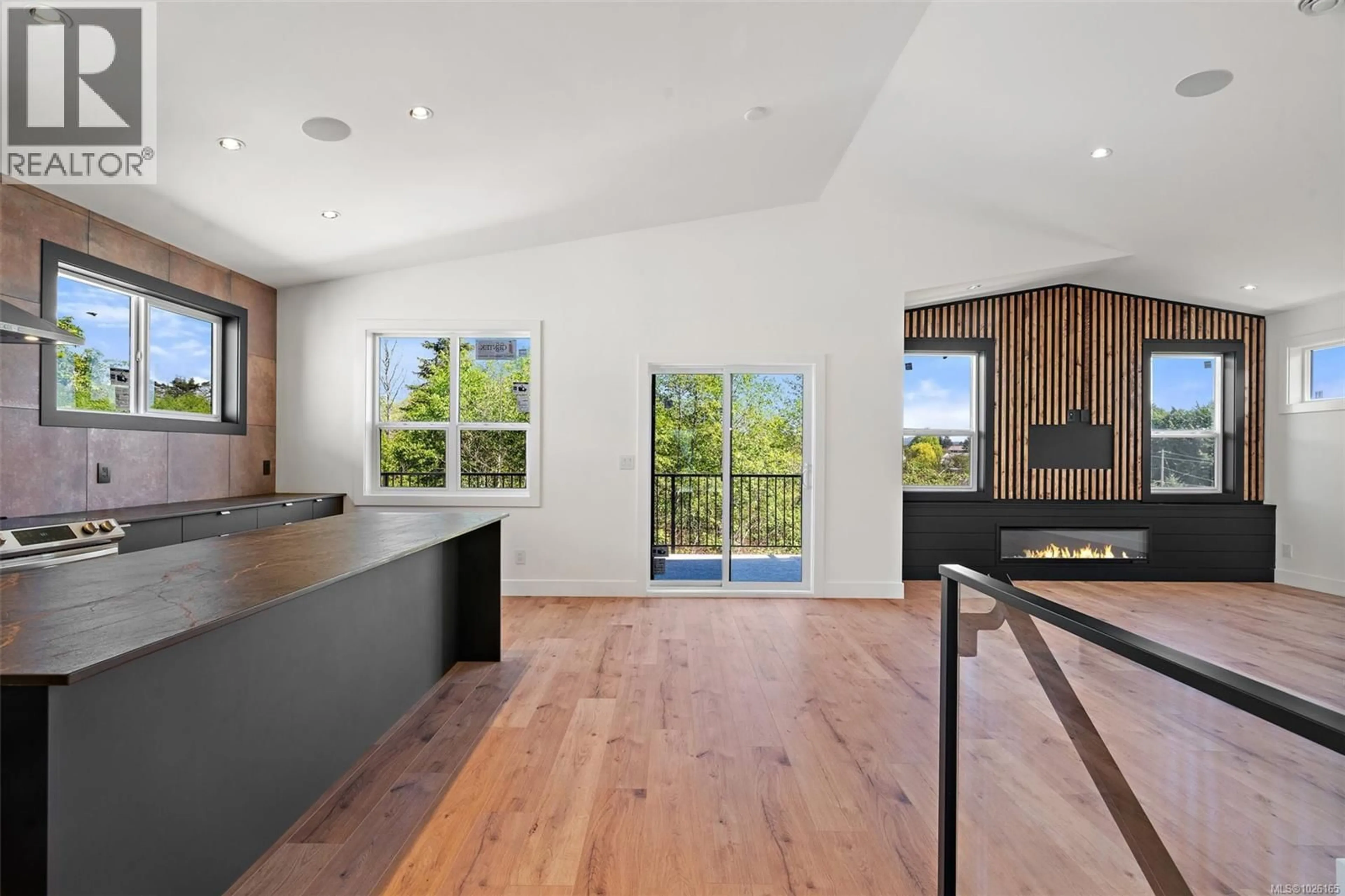 Open concept kitchen, wood/laminate floor for 2026 STONE HEARTH LANE, Sooke British Columbia V9Z1L3