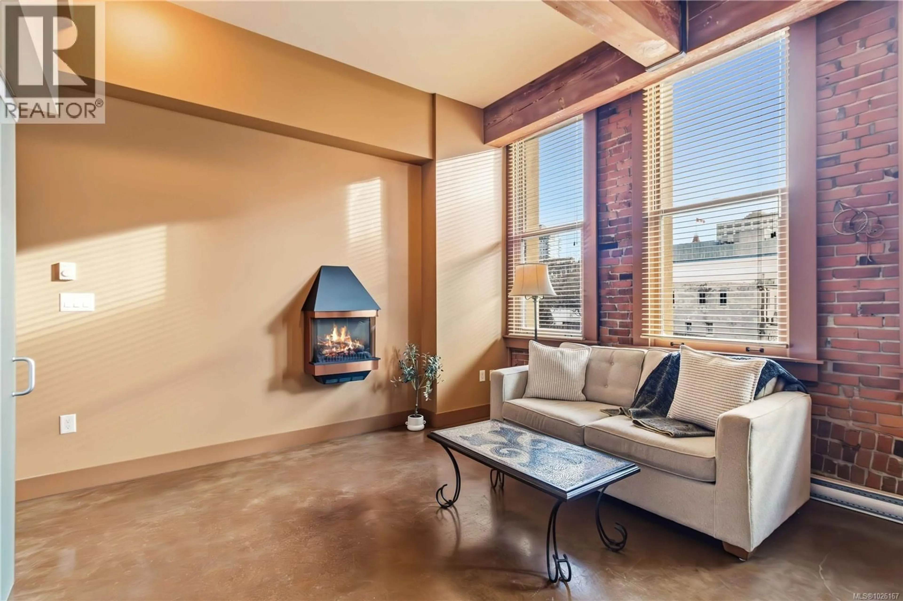 Living room with furniture, unknown for 214 - 599 PANDORA AVENUE, Victoria British Columbia V8W1N5