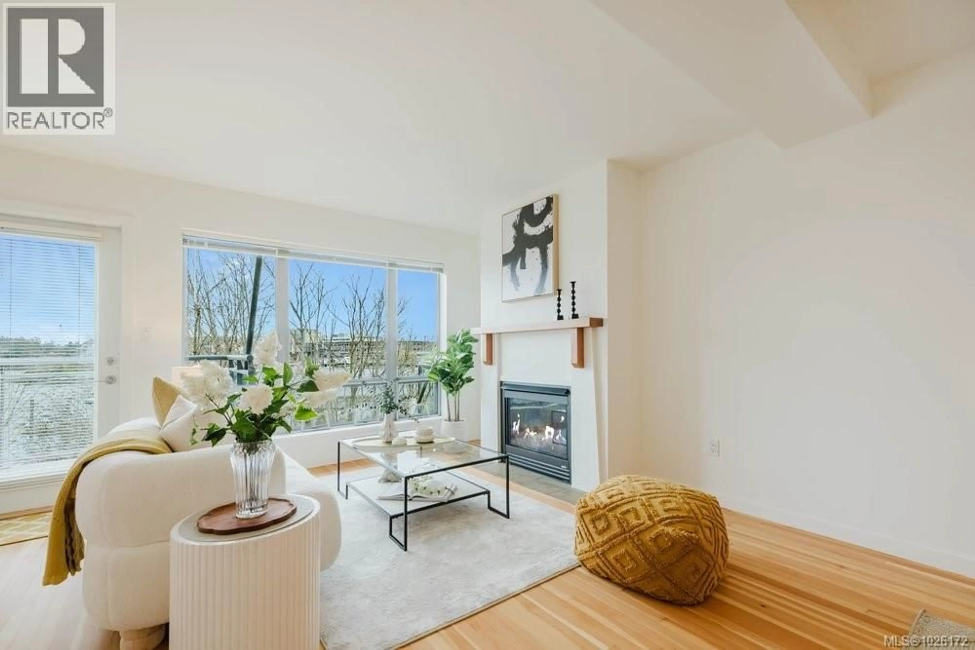 Living room with furniture, wood/laminate floor for 11 - 864 CENTRAL SPUR ROAD, Victoria British Columbia V9A0C1