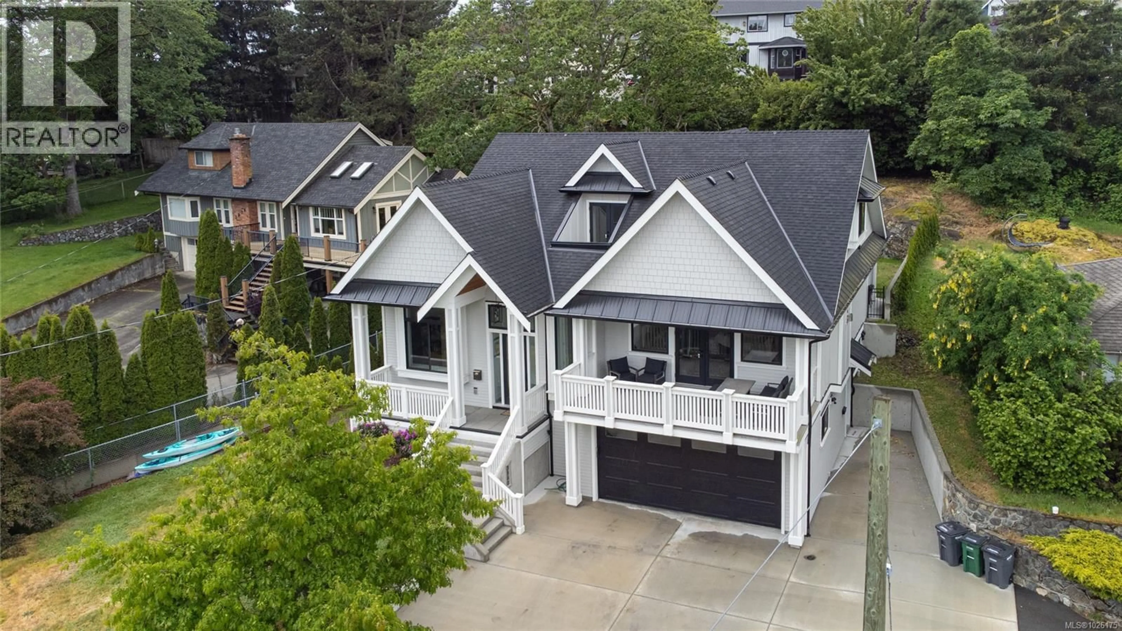A pic from outside/outdoor area/front of a property/back of a property/a pic from drone, street for 3880 WILKINSON ROAD, Saanich British Columbia V8Z5A2
