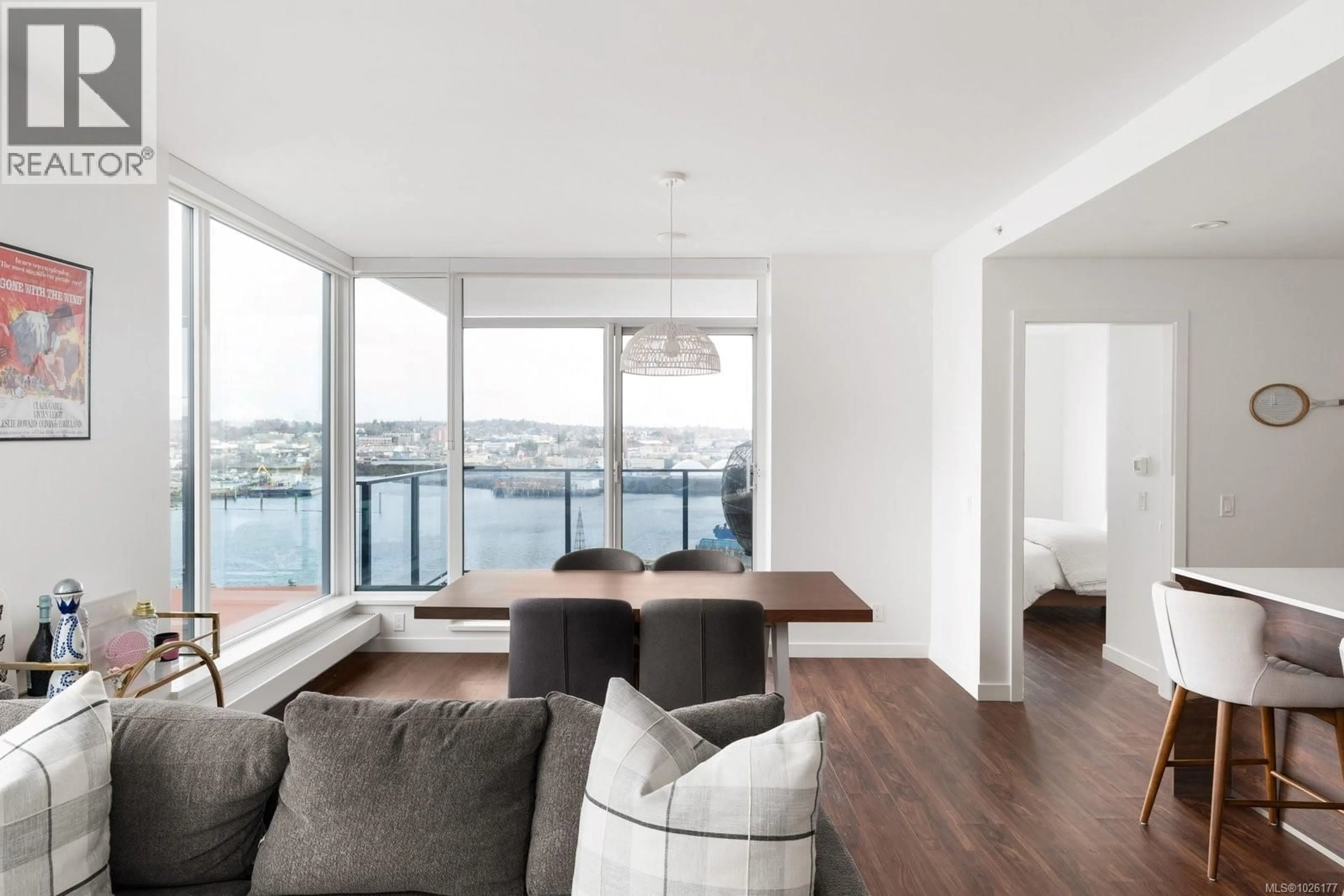 Living room with furniture, wood/laminate floor for 801 - 369 TYEE ROAD, Victoria British Columbia V9A0B6