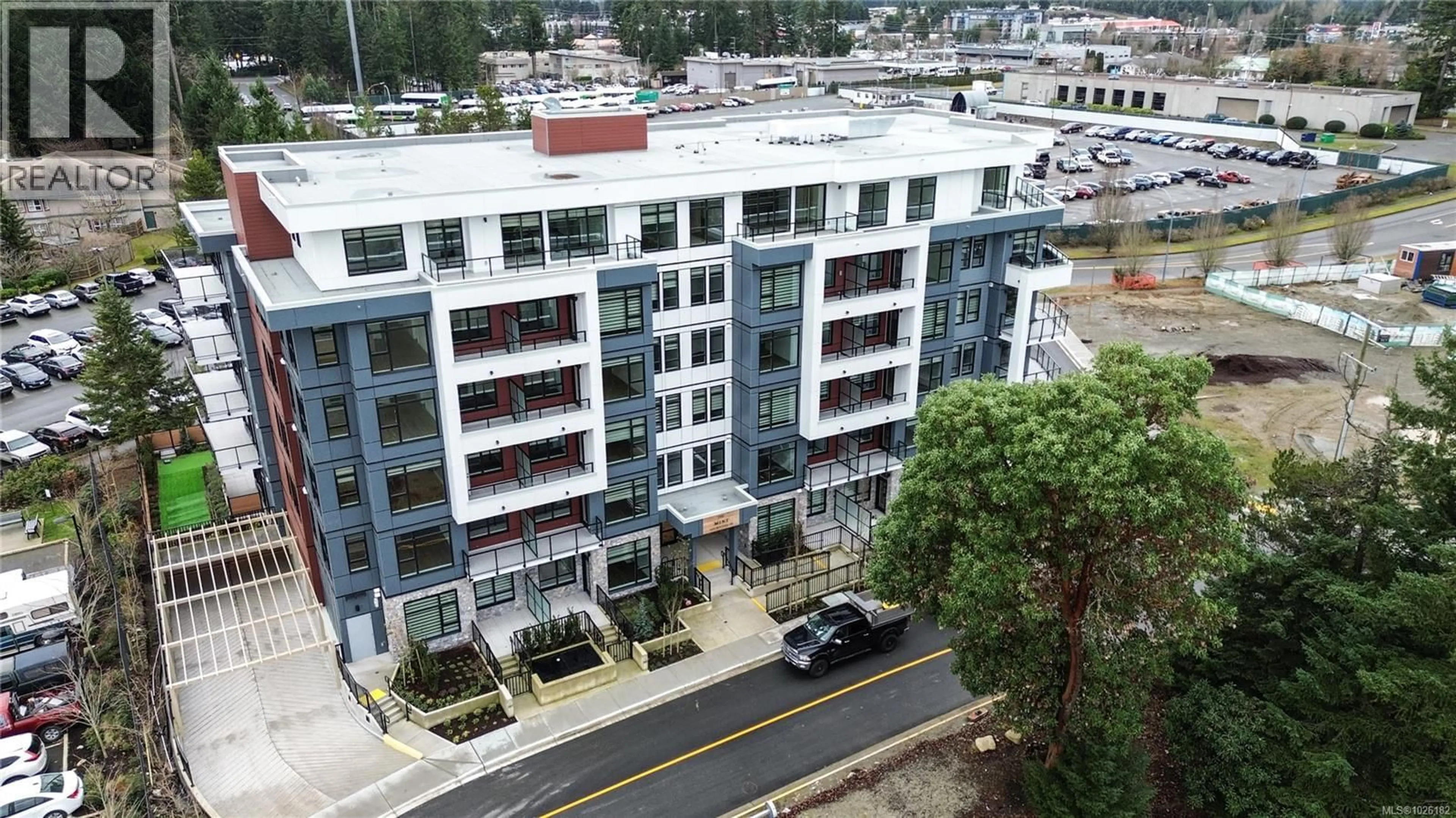 A pic from outside/outdoor area/front of a property/back of a property/a pic from drone, city buildings view from balcony for 106 - 6320 SENTINAL DRIVE, Nanaimo British Columbia V9V1W4