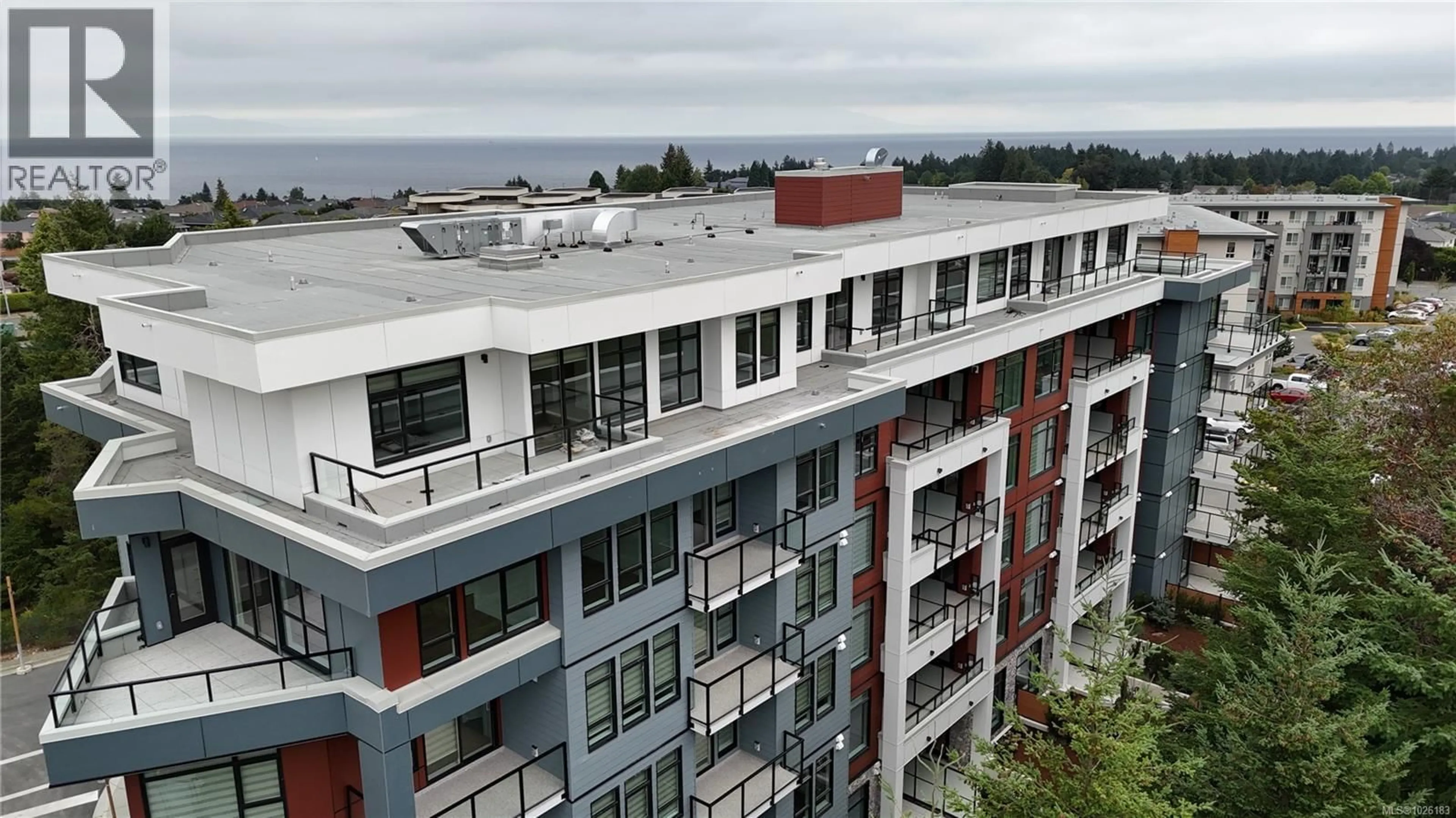 A pic from outside/outdoor area/front of a property/back of a property/a pic from drone, city buildings view from balcony for 206 - 6320 SENTINAL DRIVE, Nanaimo British Columbia V9V1W4