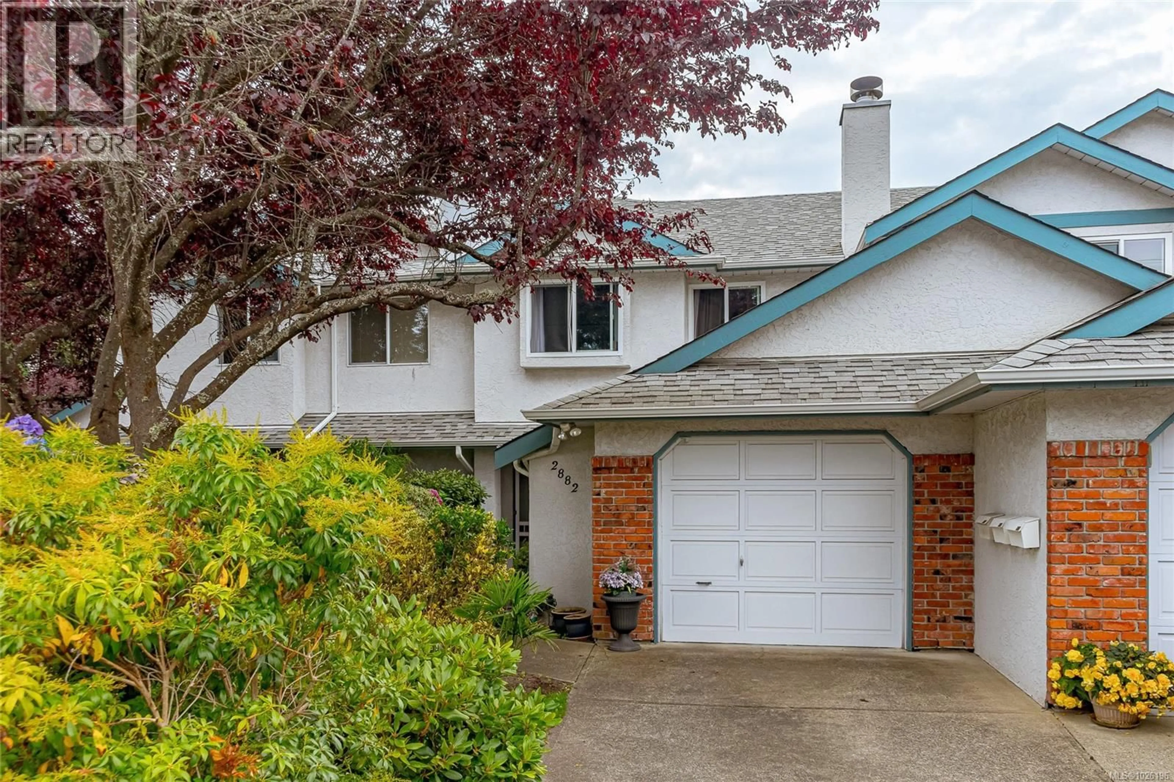 Home with vinyl exterior material, street for 2882 BELMONT AVENUE, Victoria British Columbia V8R6T3