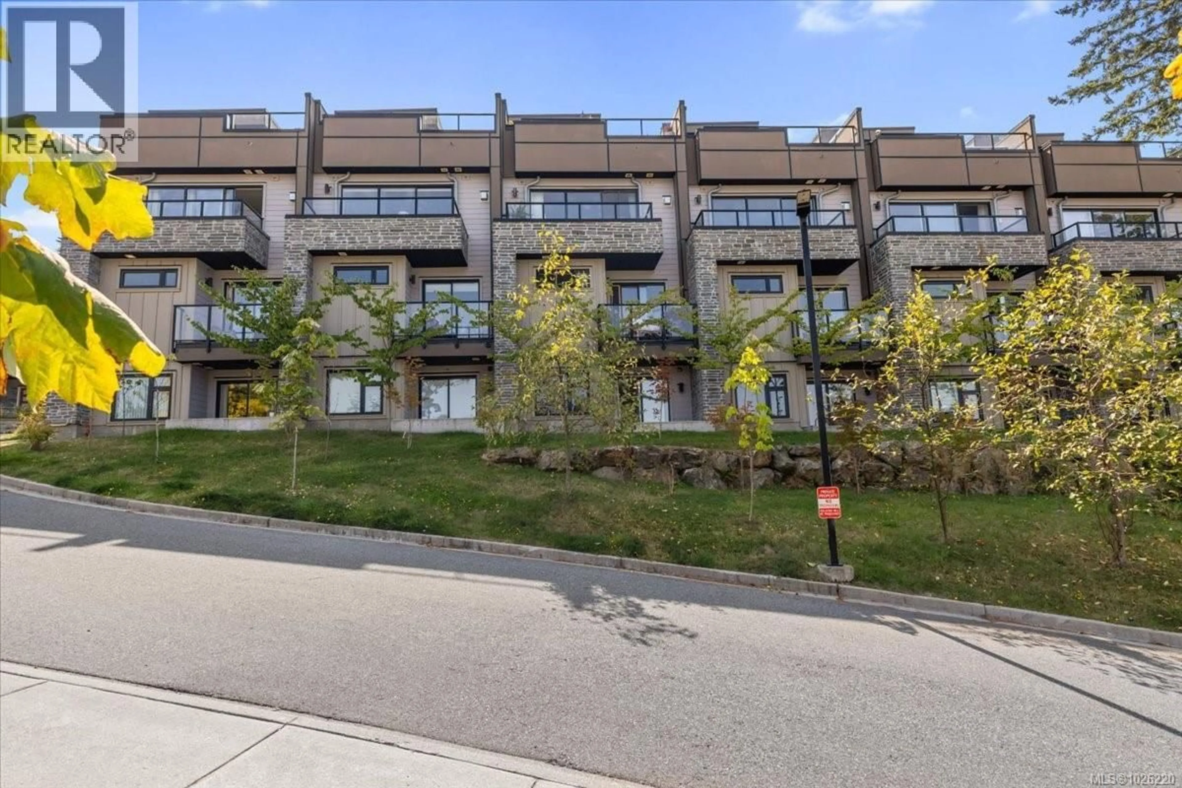 A pic from outside/outdoor area/front of a property/back of a property/a pic from drone, street for 102 - 5711 VANDERNEUK ROAD, Nanaimo British Columbia V9T5H3