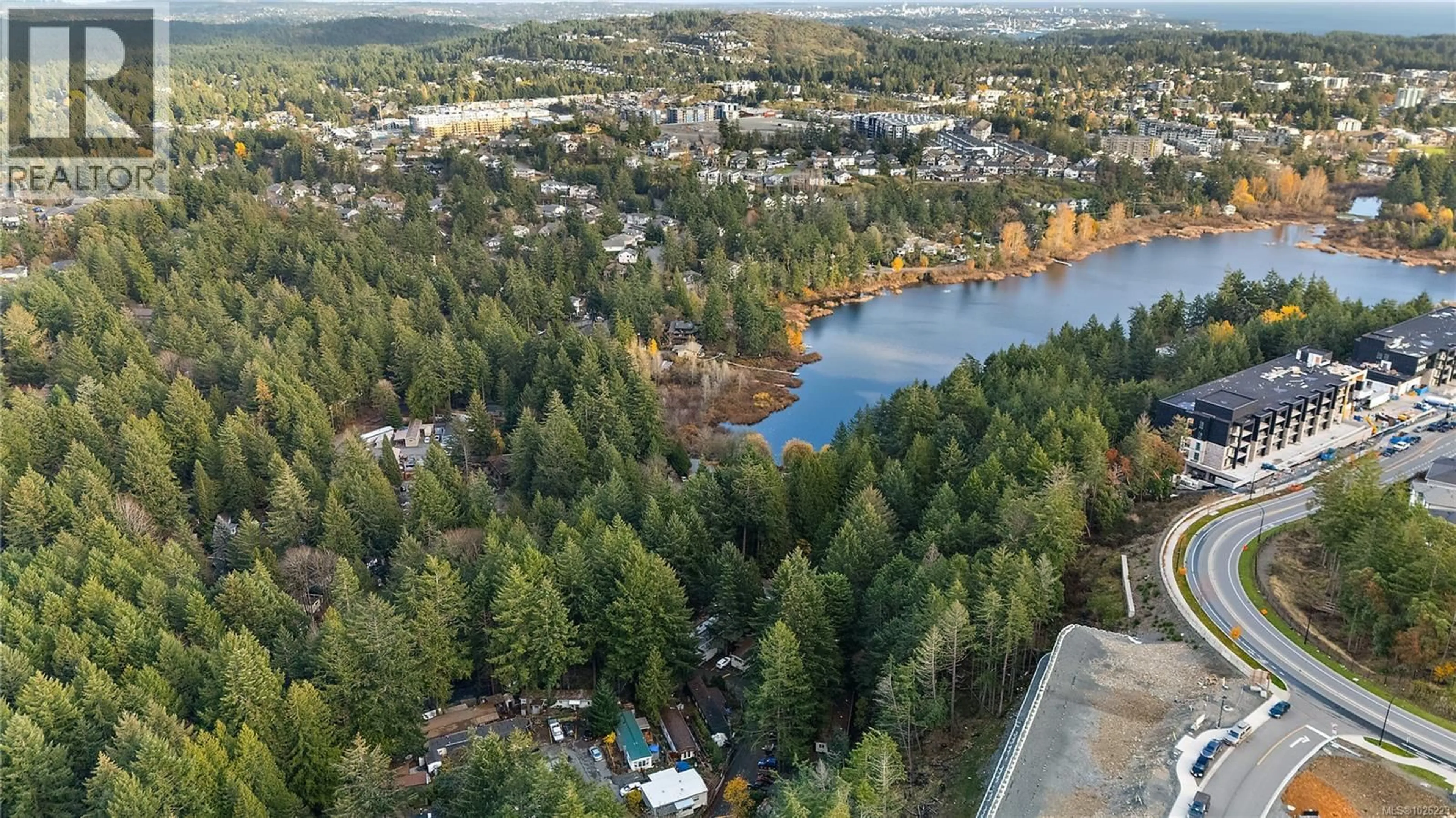 A pic from outside/outdoor area/front of a property/back of a property/a pic from drone, water/lake/river/ocean view for 119 - 2500 FLORENCE LAKE ROAD, Langford British Columbia V9B4H2