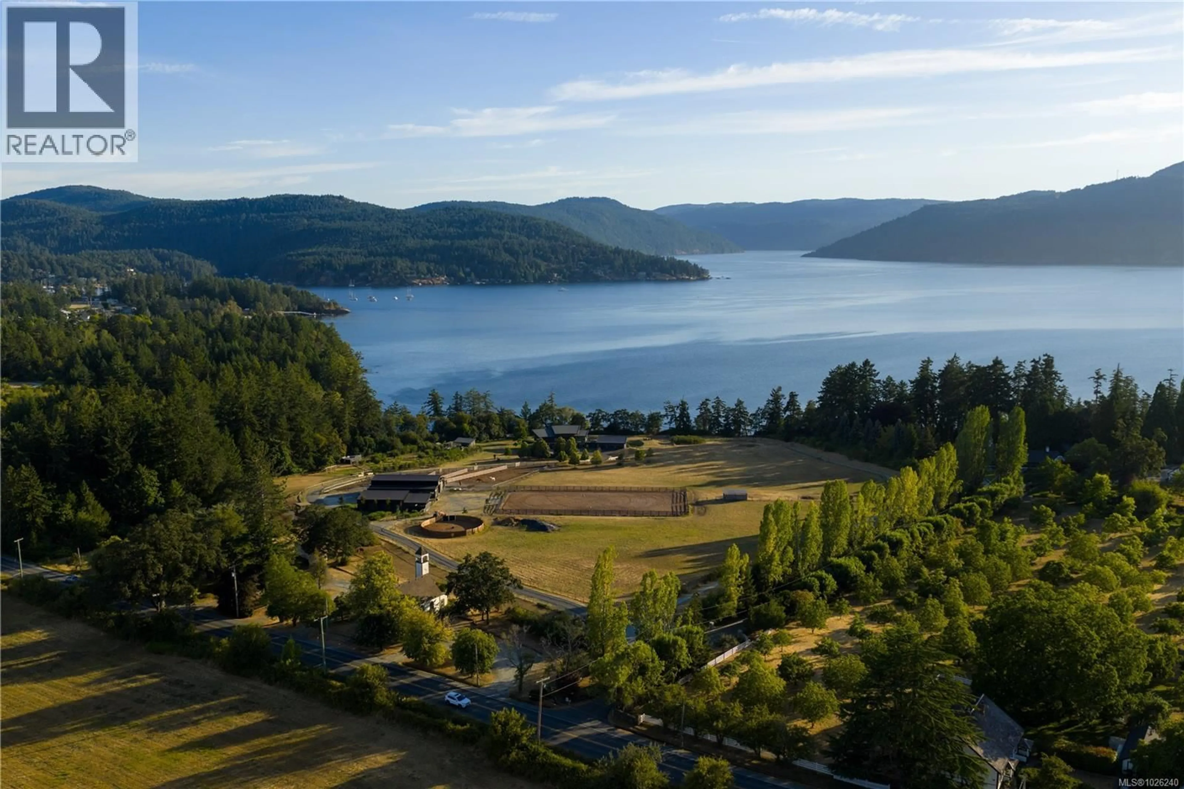 A pic from outside/outdoor area/front of a property/back of a property/a pic from drone, water/lake/river/ocean view for 7756 WEST SAANICH ROAD, Central Saanich British Columbia V8M1R8