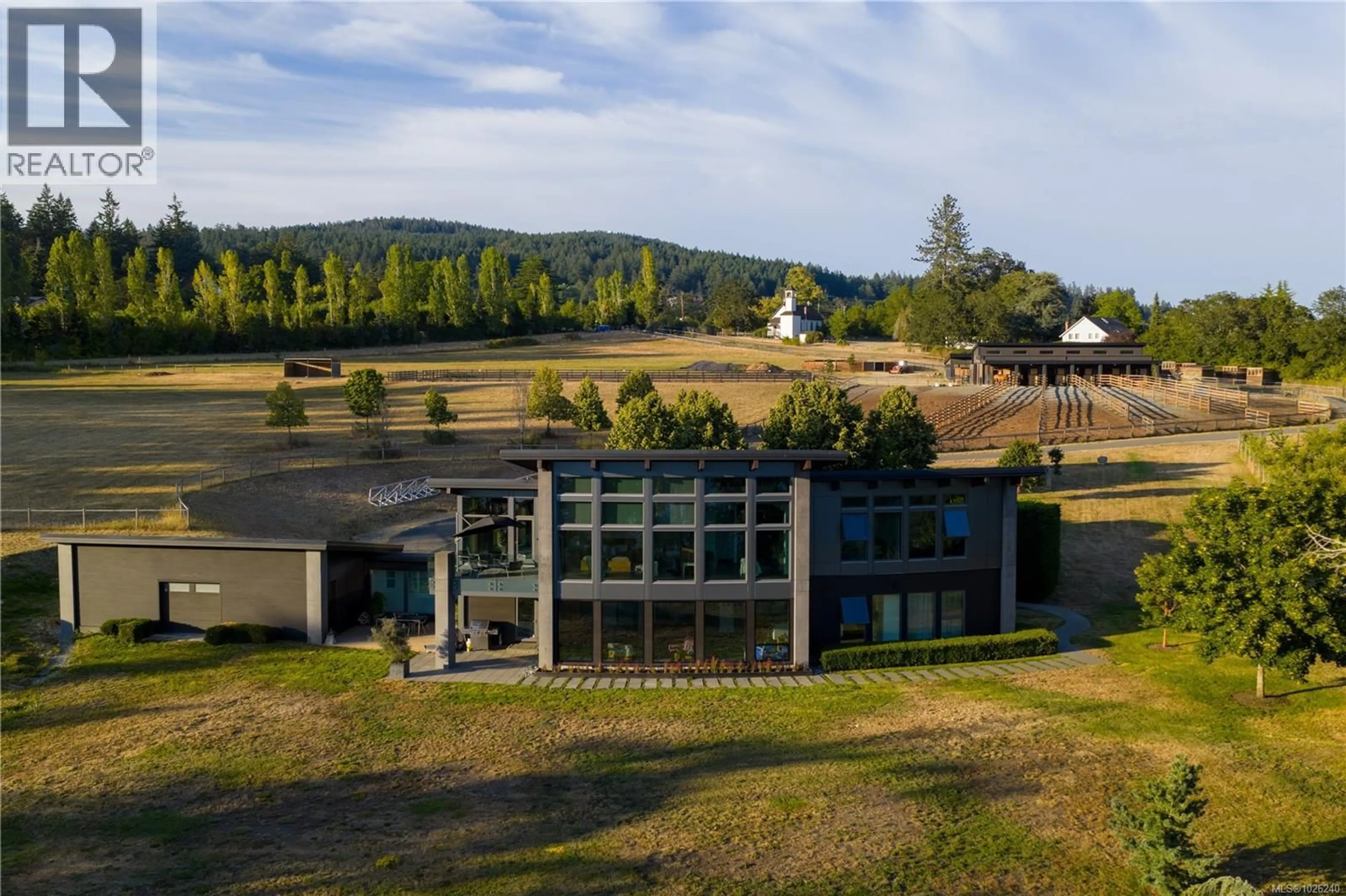 A pic from outside/outdoor area/front of a property/back of a property/a pic from drone, mountain view for 7756 WEST SAANICH ROAD, Central Saanich British Columbia V8M1R8