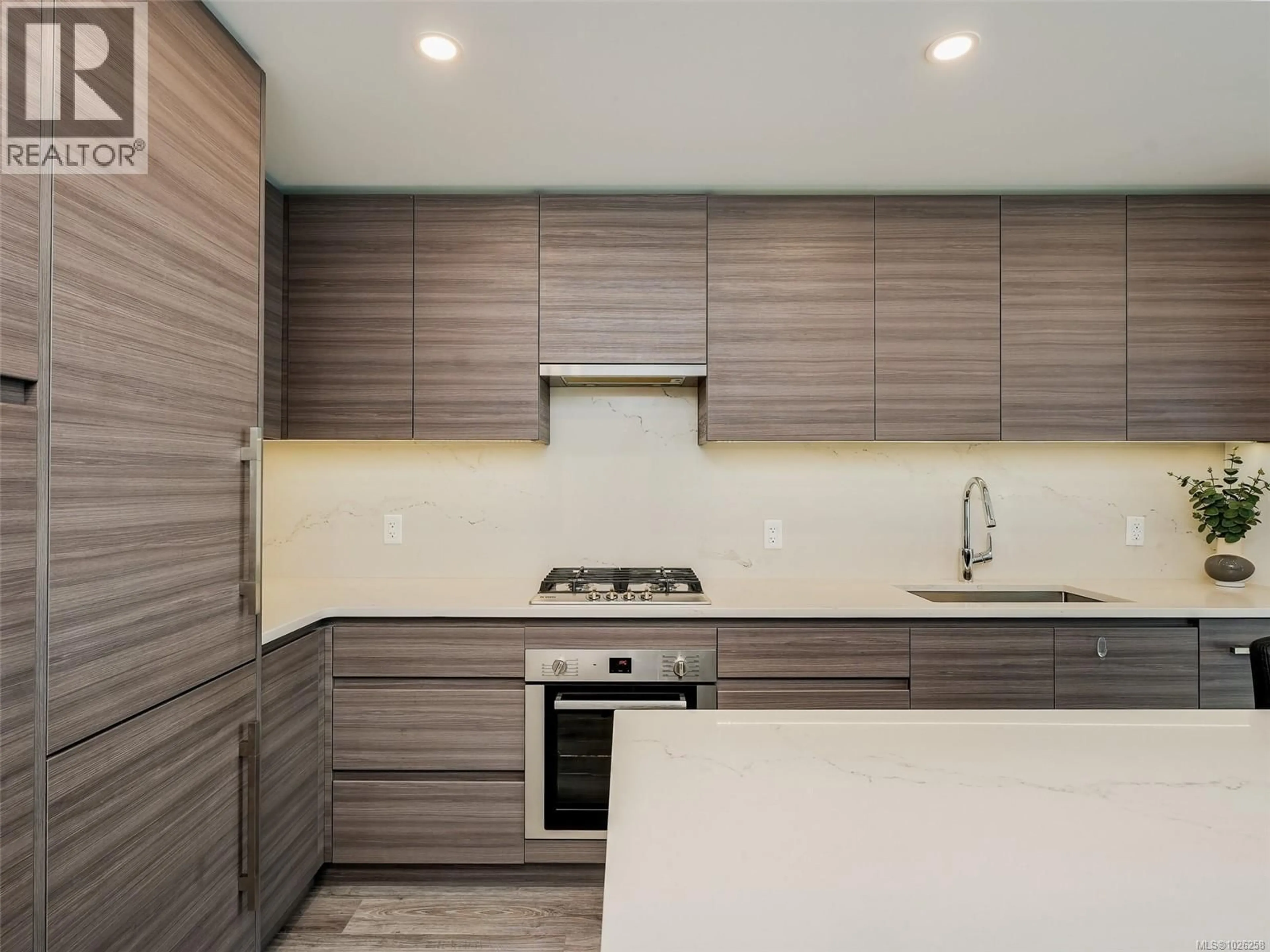 Contemporary kitchen, wood/laminate floor for 802 - 777 HERALD STREET, Victoria British Columbia V8W1S5