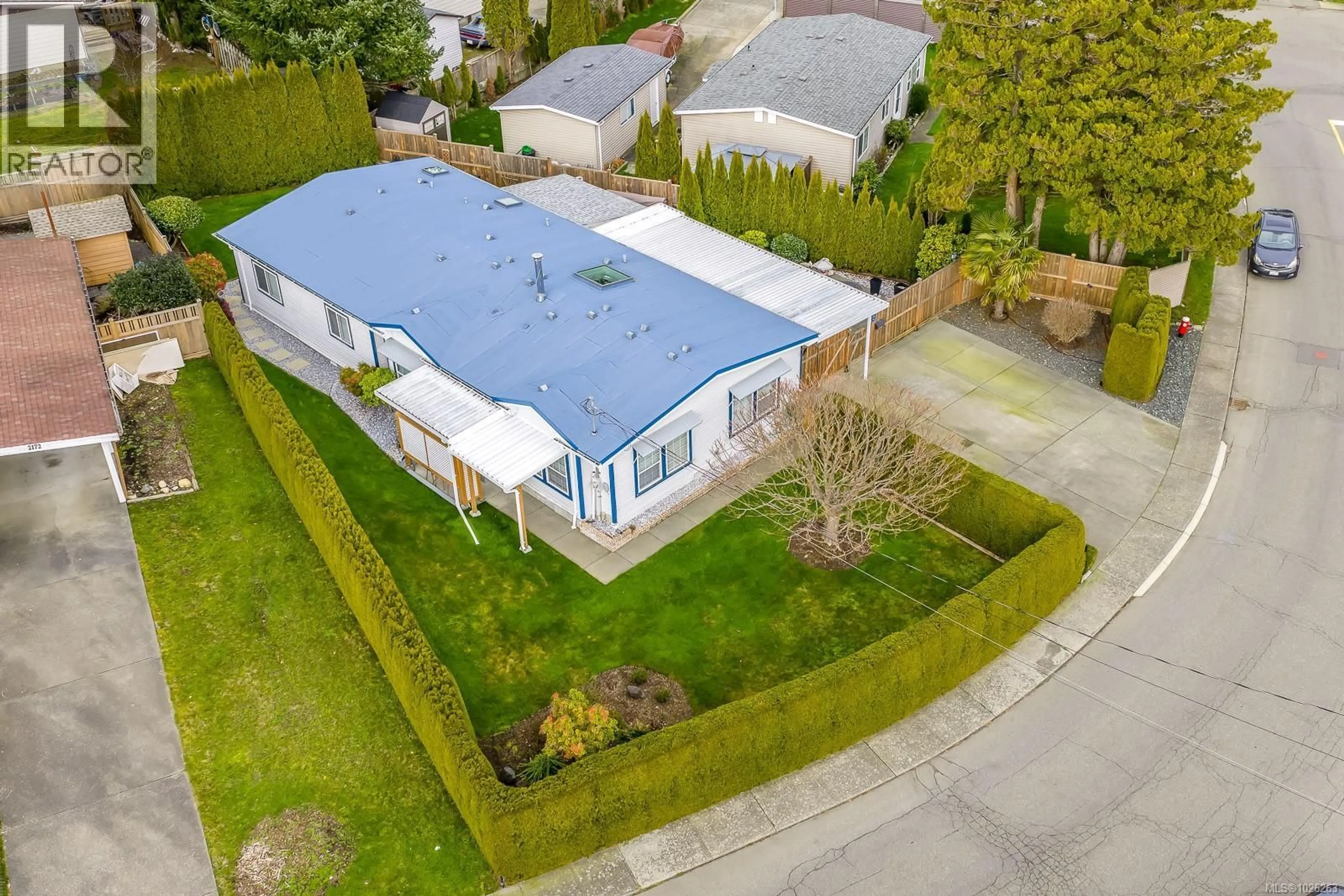 A pic from outside/outdoor area/front of a property/back of a property/a pic from drone, street for 2184 6TH STREET EAST, Courtenay British Columbia V9N7L8