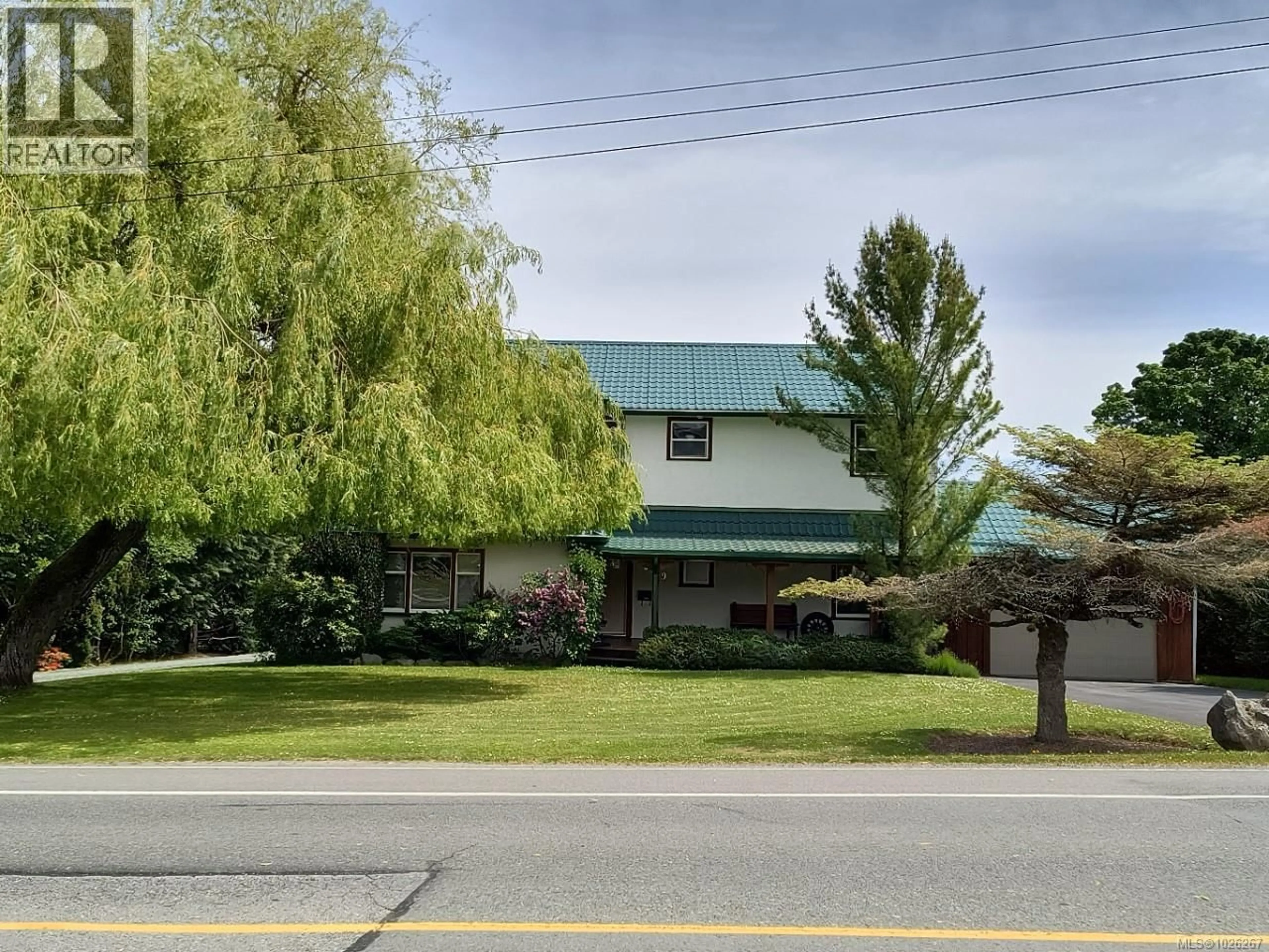 A pic from outside/outdoor area/front of a property/back of a property/a pic from drone, mountain view for 9159 EAST SAANICH ROAD, North Saanich British Columbia V8L0H6