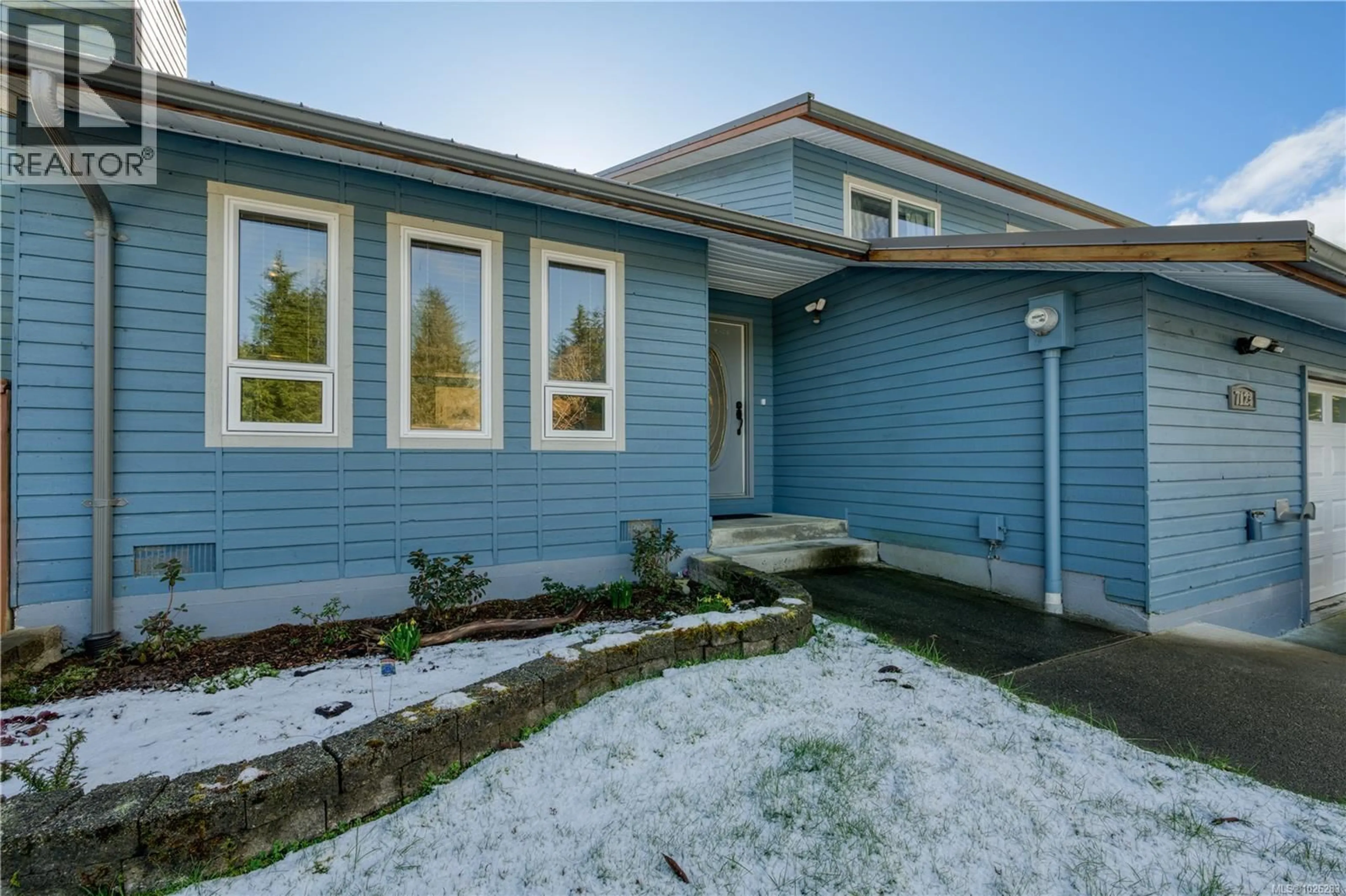 Home with vinyl exterior material, street for 7123 HIGHLAND DRIVE, Port Hardy British Columbia V0N2P0