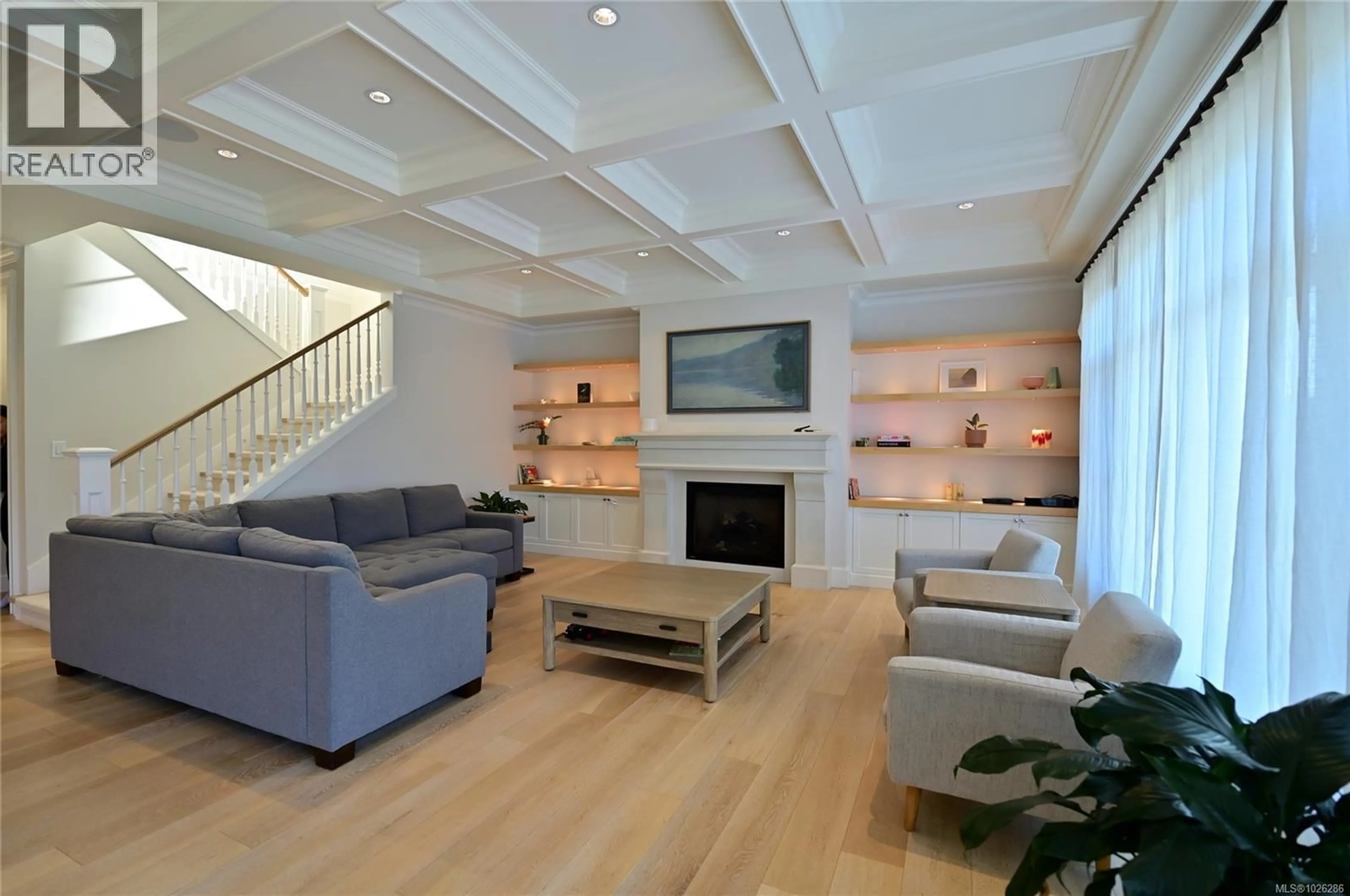 Living room with furniture, wood/laminate floor for 2777 DEWDNEY AVENUE, Oak Bay British Columbia V8R3M3