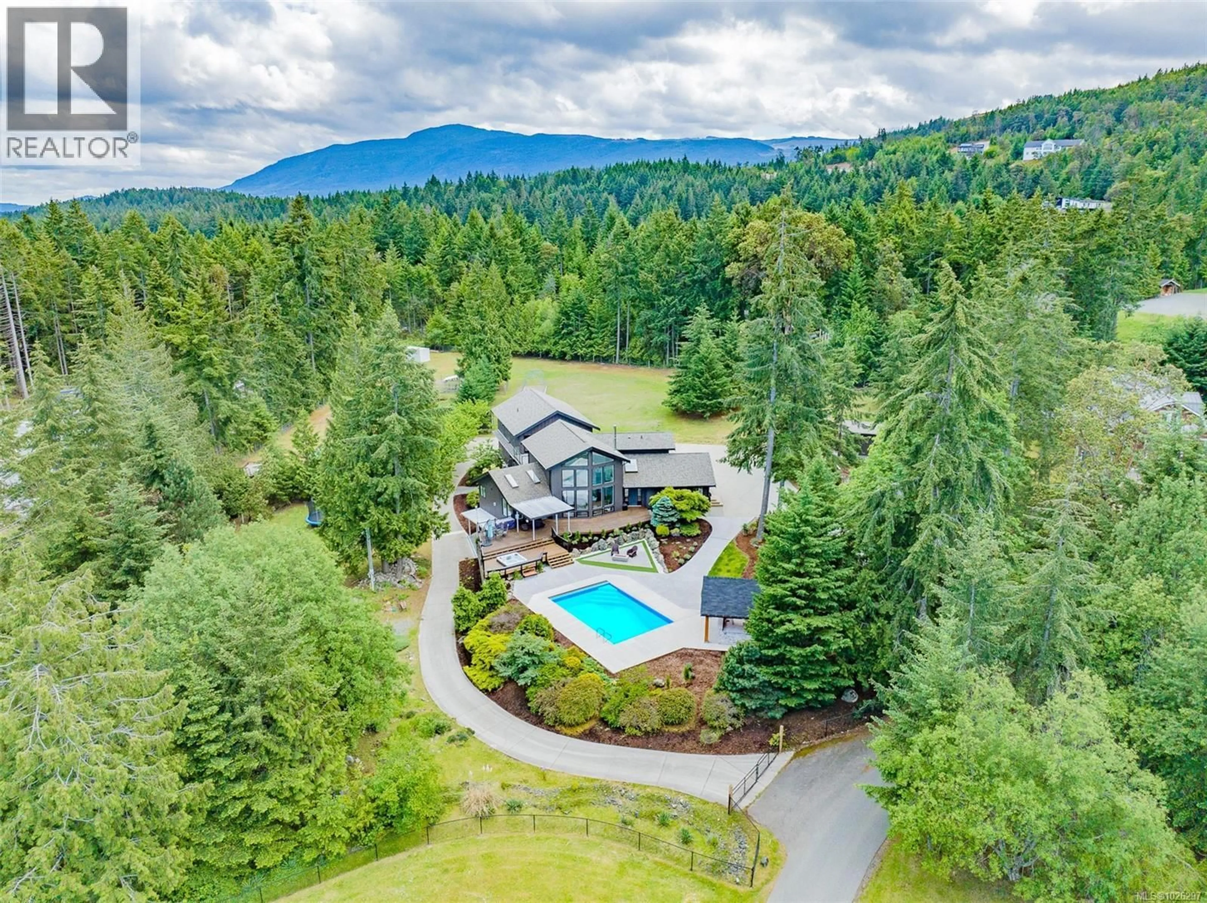 A pic from outside/outdoor area/front of a property/back of a property/a pic from drone, mountain view for 7255 AULDS ROAD, Lantzville British Columbia V0R2H0