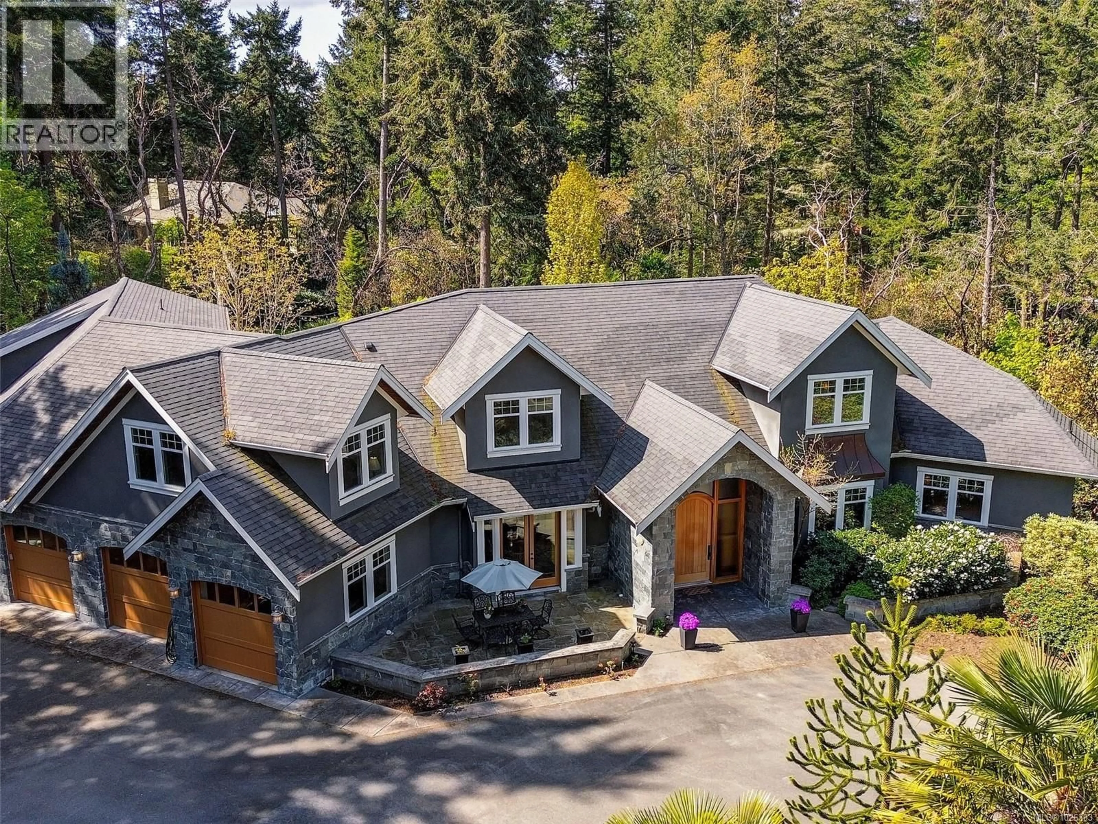 A pic from outside/outdoor area/front of a property/back of a property/a pic from drone, mountain view for 2615 QUEENSWOOD DRIVE, Saanich British Columbia V8N1X6