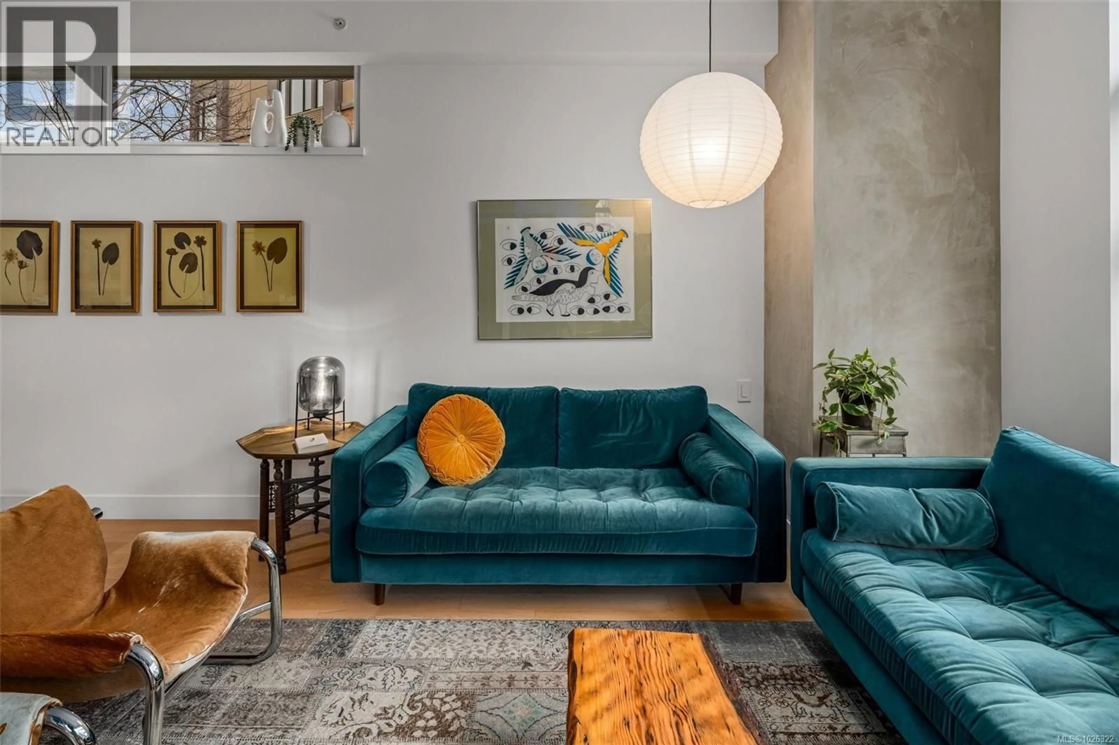 Living room with furniture, cement floor for 116 - 365 WATERFRONT CRESCENT, Victoria British Columbia V8T0A6