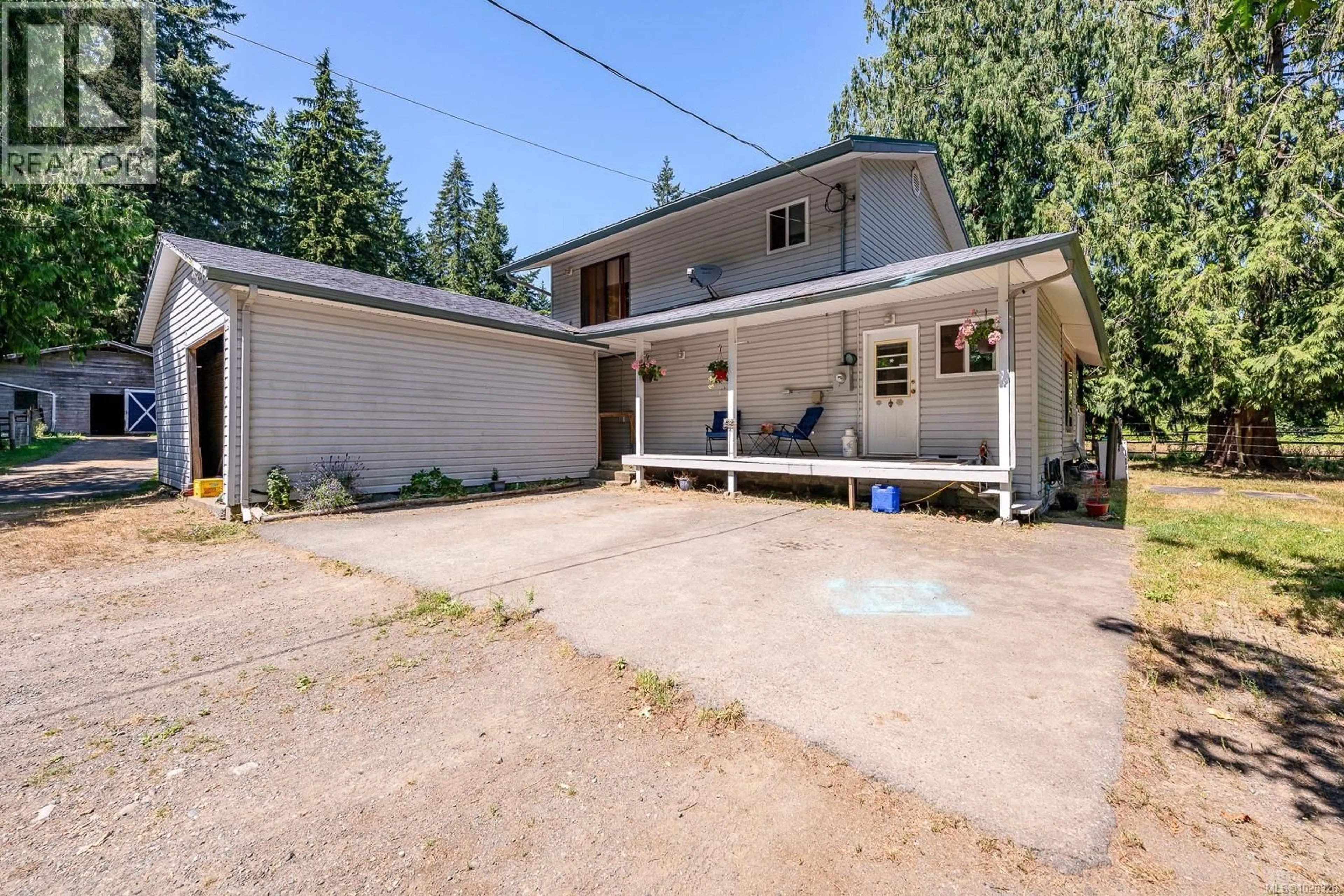 A pic from outside/outdoor area/front of a property/back of a property/a pic from drone, street for 2468 ENDALL ROAD, Black Creek British Columbia V0R1C0