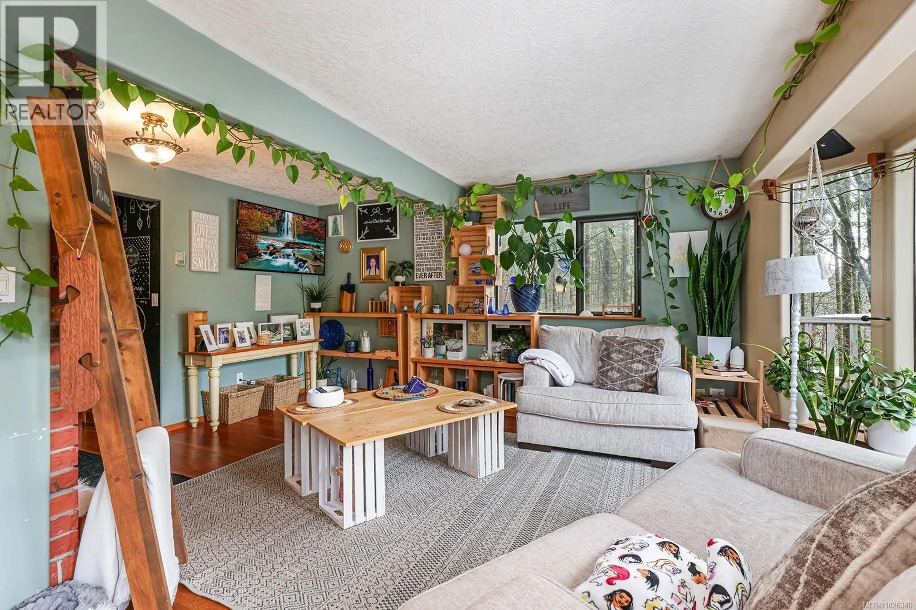 Living room with furniture, unknown for 4026 MACAULAY ROAD, Black Creek British Columbia V9J1C8