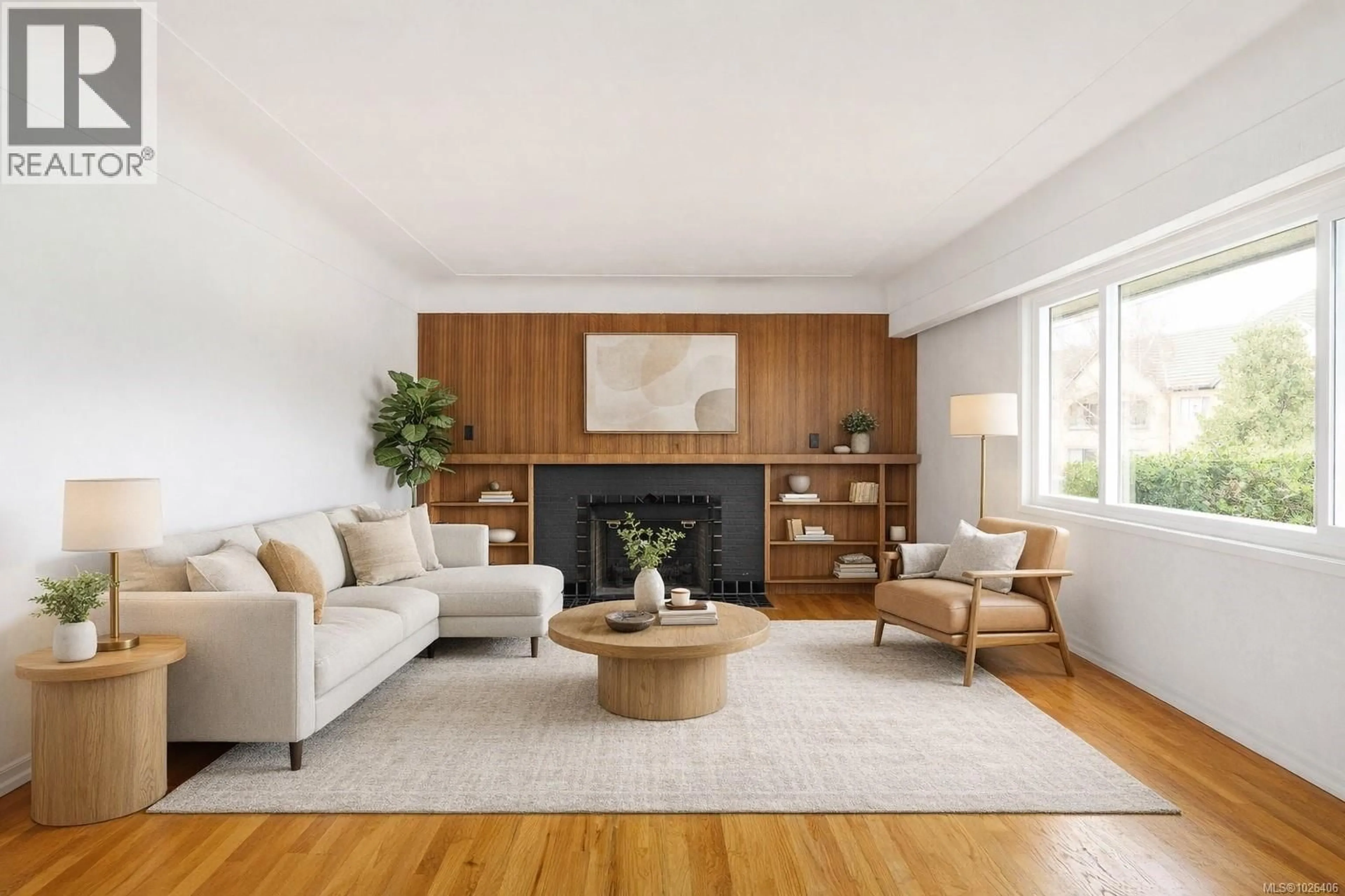 Living room with furniture, wood/laminate floor for 1721 TOWNLEY STREET, Saanich British Columbia V8R3A6