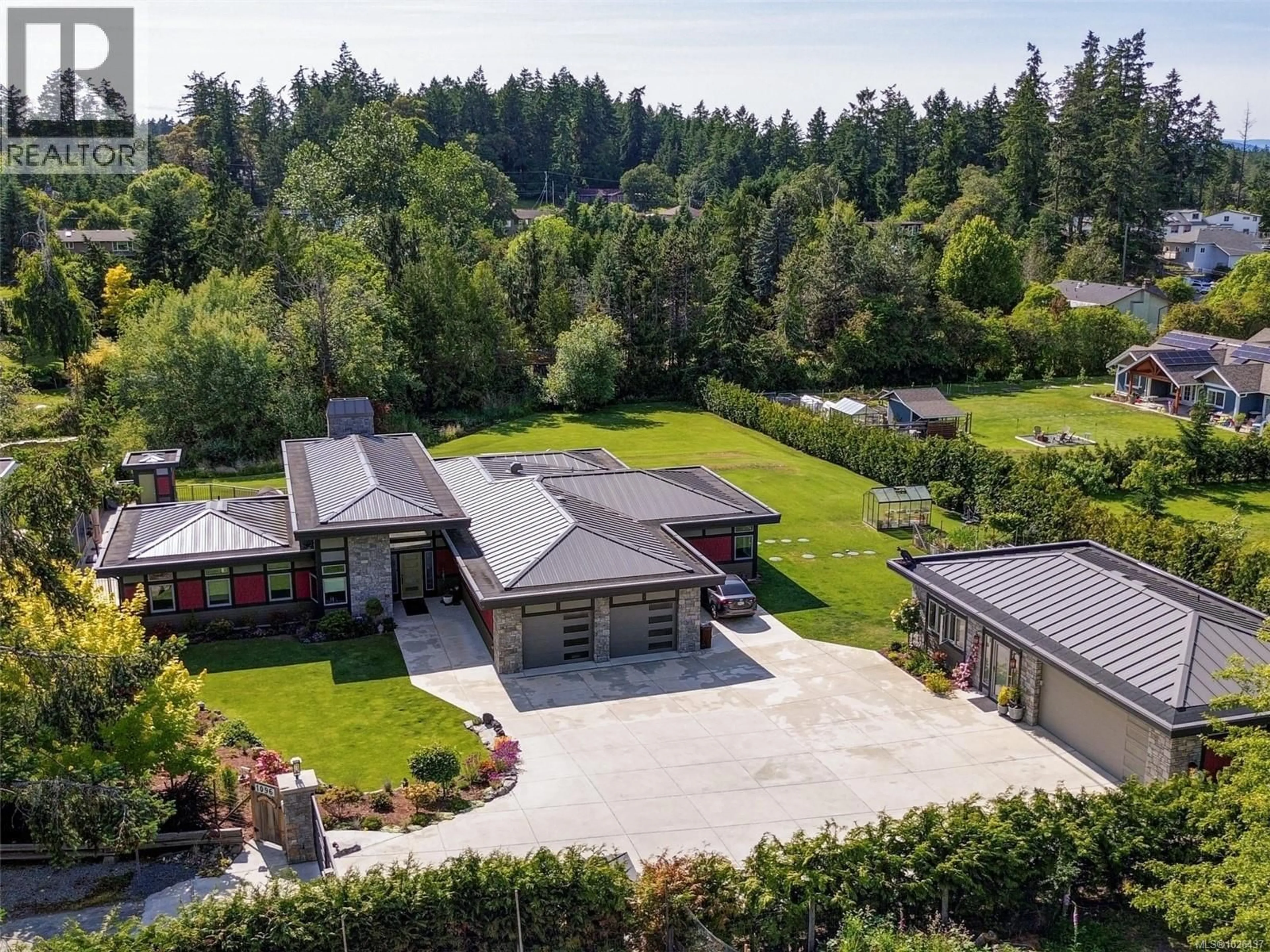A pic from outside/outdoor area/front of a property/back of a property/a pic from drone, forest/trees view for 1096 MAPLE ROAD, North Saanich British Columbia V8L5P5