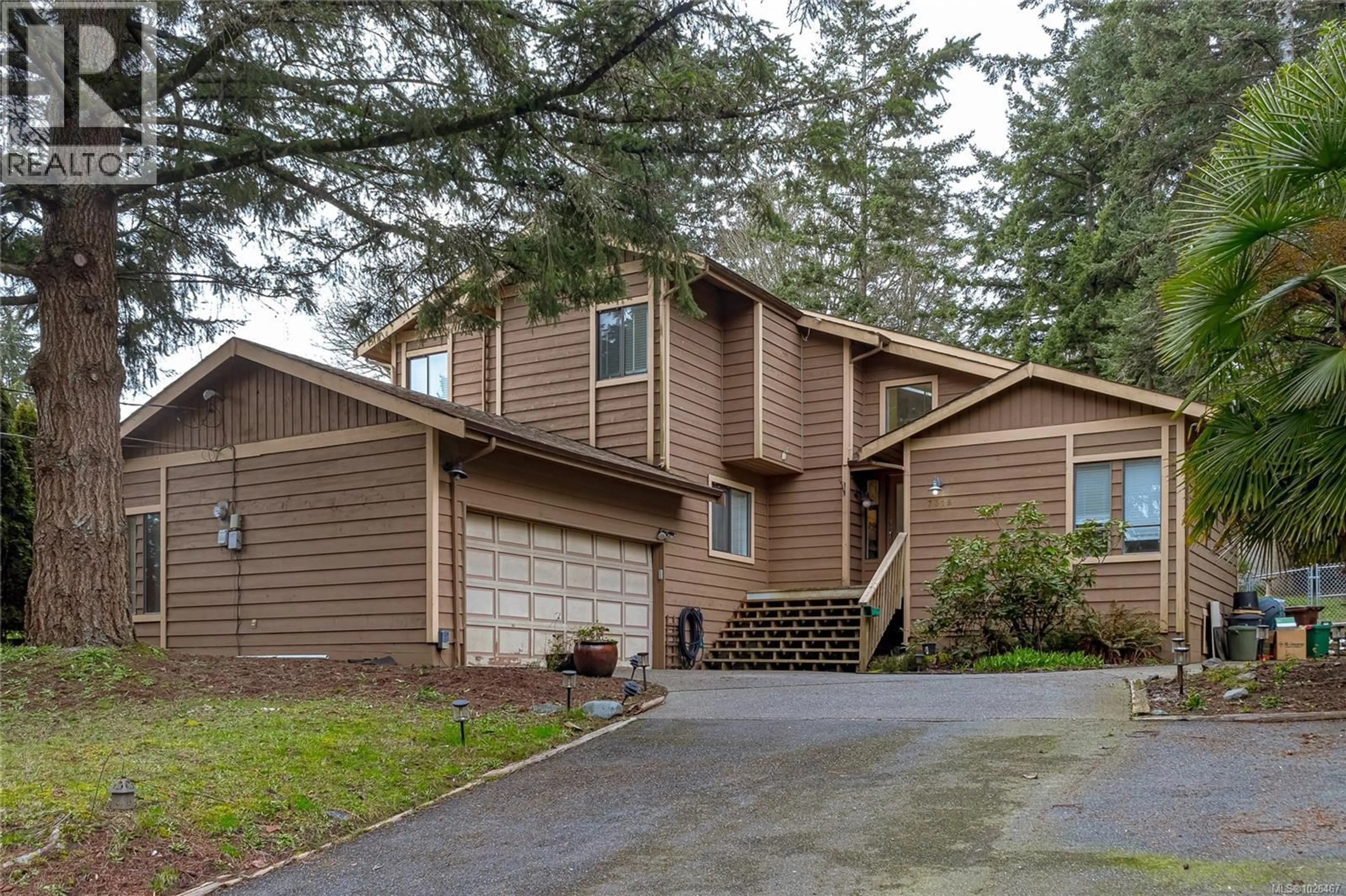 Home with vinyl exterior material, unknown for 7318 VEYANESS ROAD, Central Saanich British Columbia V8M1M3