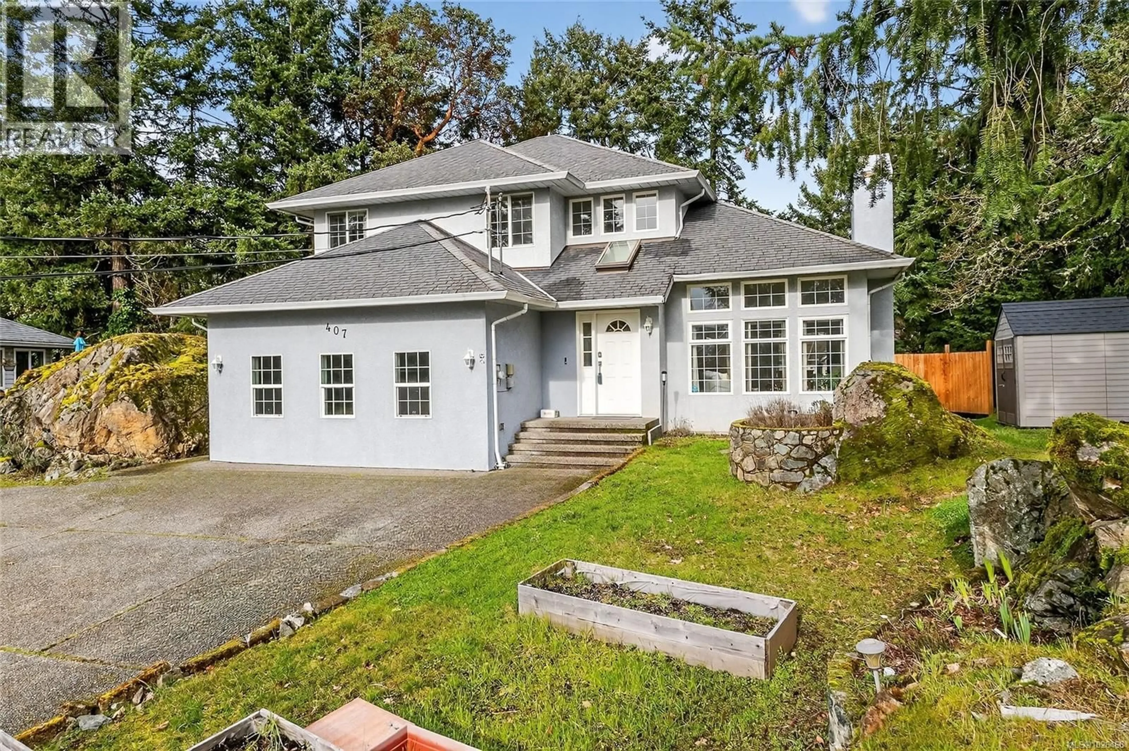 Home with vinyl exterior material, street for 407 CORALEE PLACE, Langford British Columbia V9B6C4