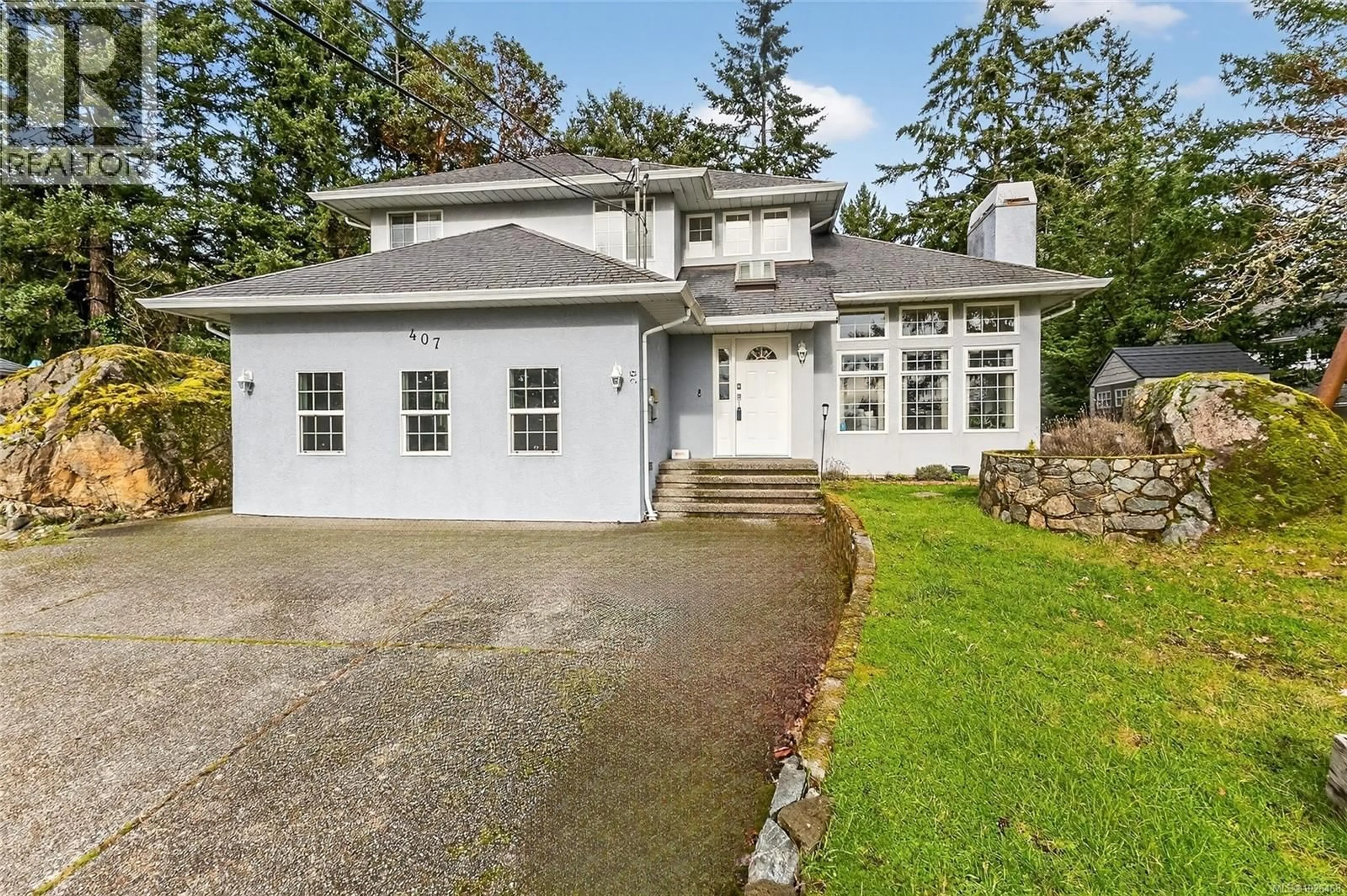 Home with vinyl exterior material, street for 407 CORALEE PLACE, Langford British Columbia V9B6C4