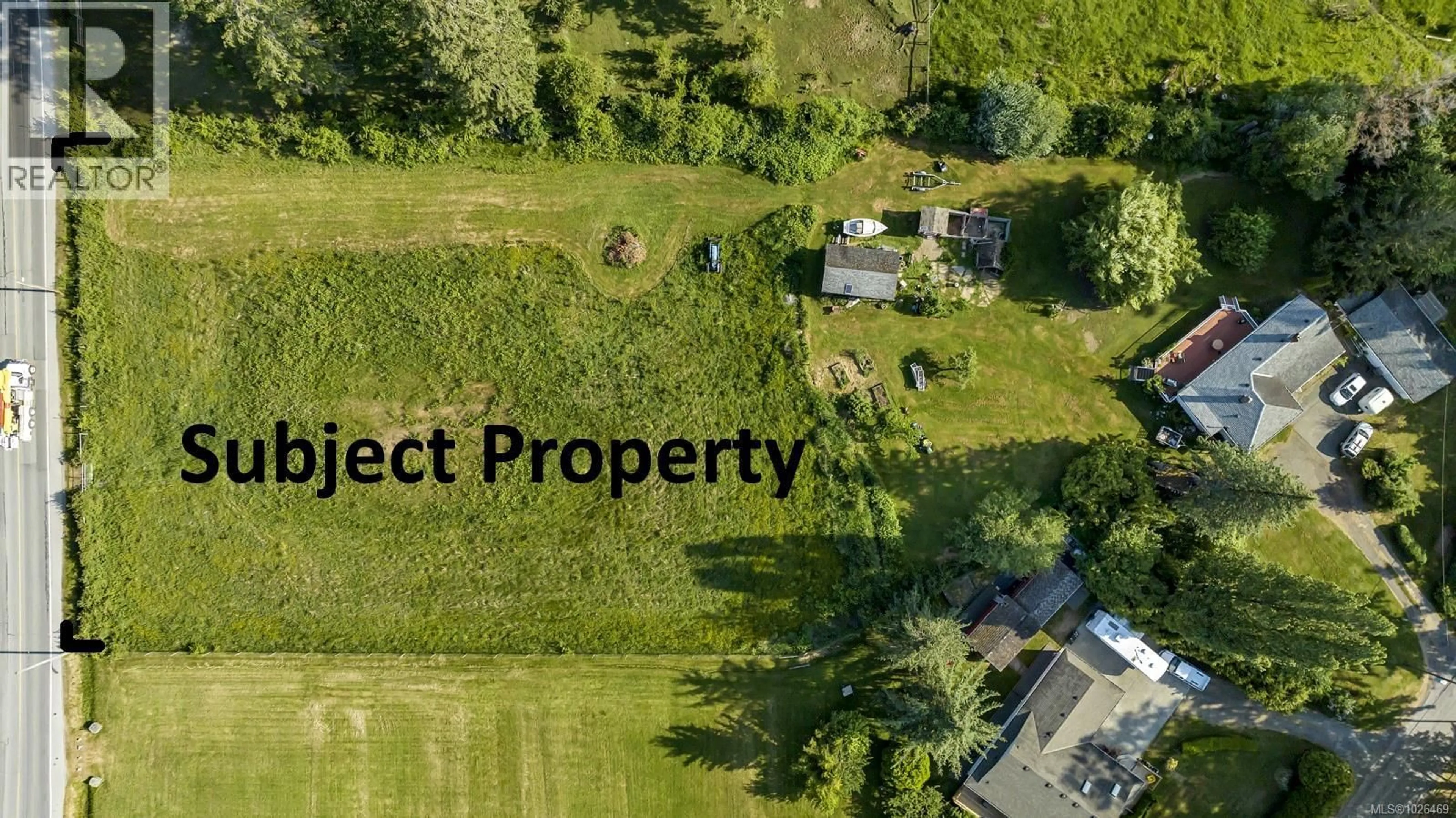 A pic from outside/outdoor area/front of a property/back of a property/a pic from drone, street for 6588 NORCROSS ROAD, Duncan British Columbia V9L6C3