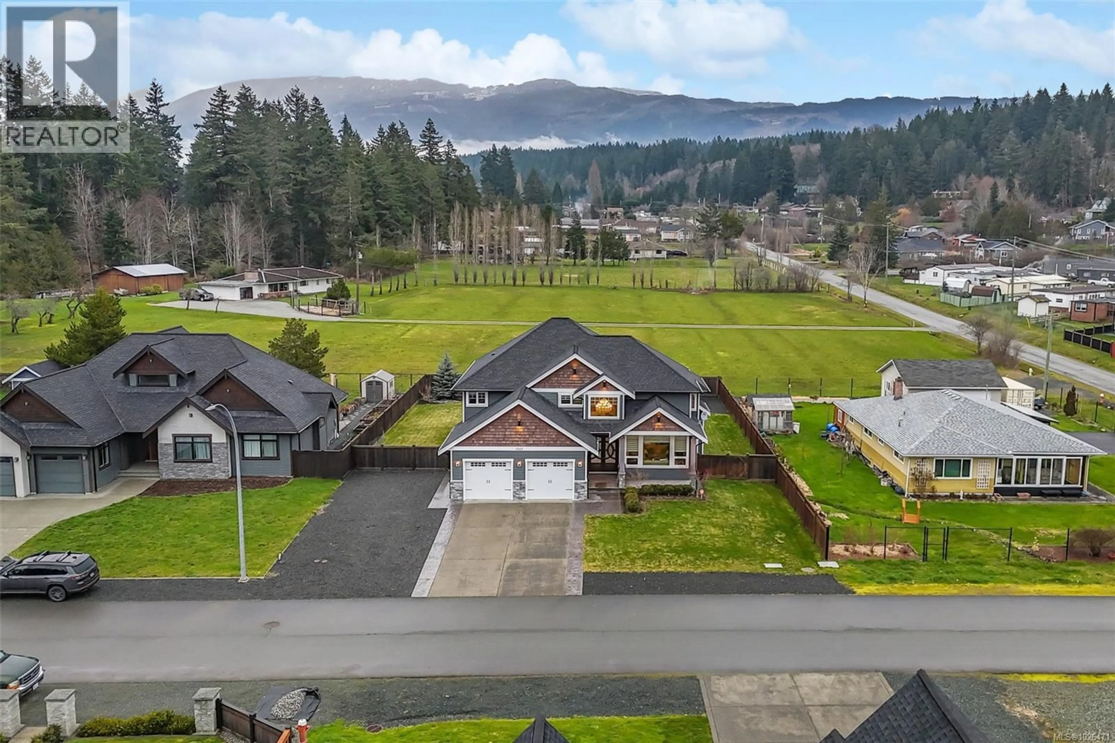 A pic from outside/outdoor area/front of a property/back of a property/a pic from drone, mountain view for 5327 OTTER PLACE, Port Alberni British Columbia V9Y8X7
