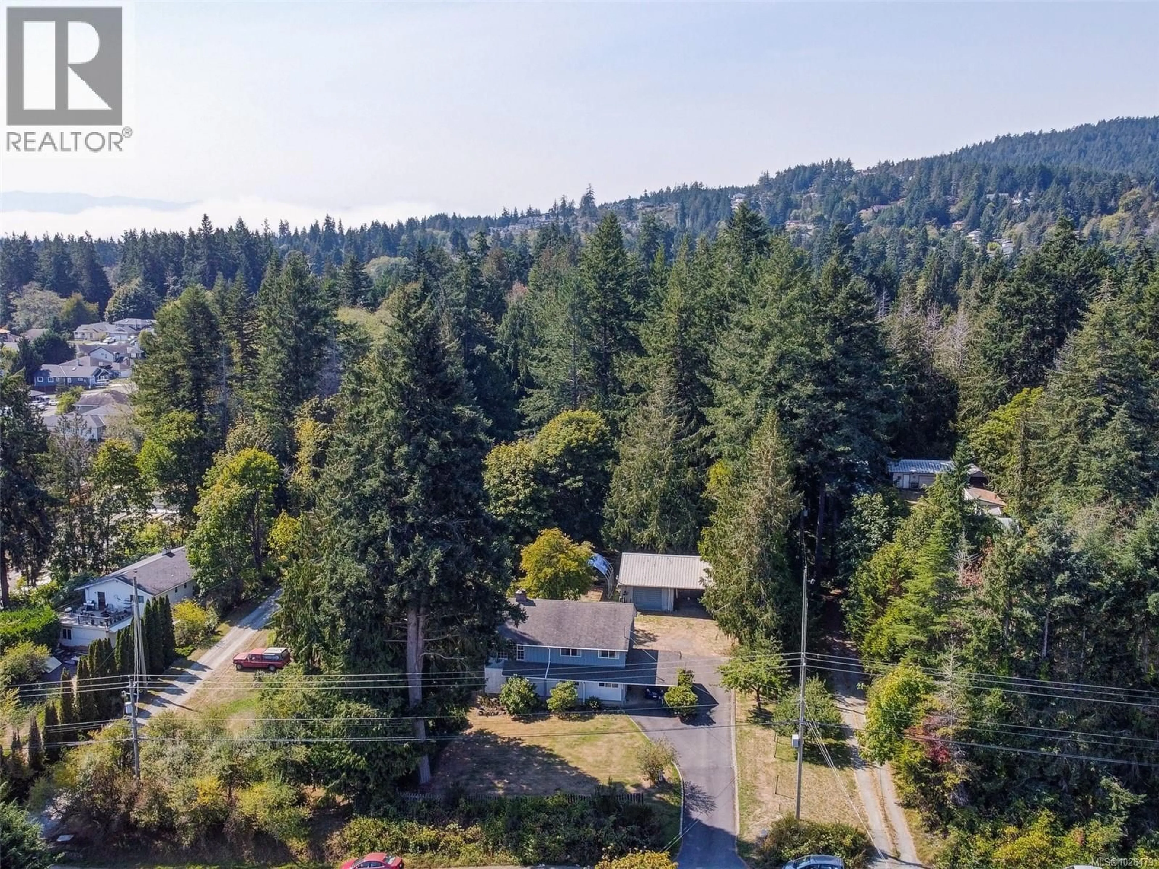 A pic from outside/outdoor area/front of a property/back of a property/a pic from drone, forest/trees view for 2338 CHURCH ROAD, Sooke British Columbia V9Z0W2